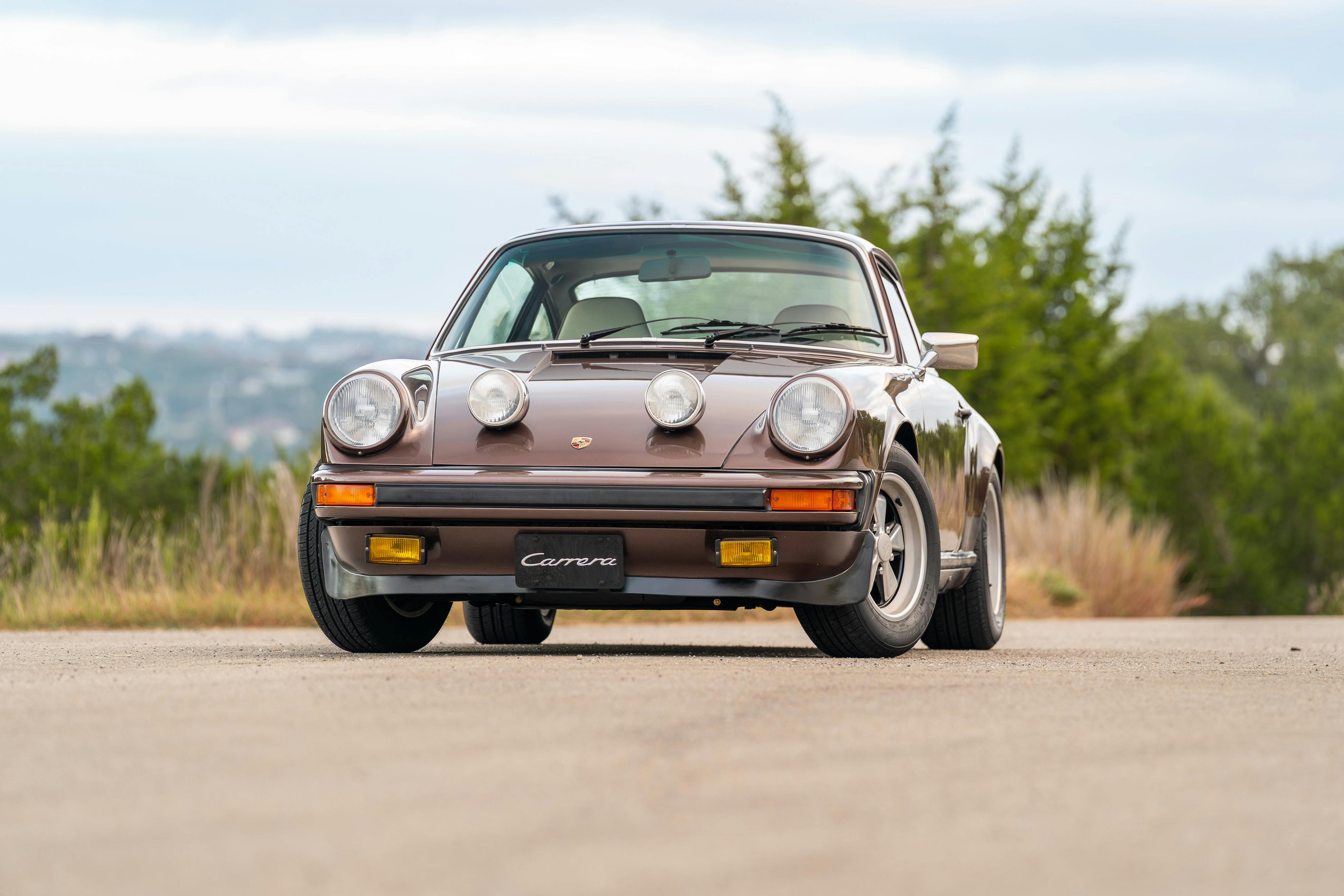 1975 Porsche 911 Carrera 2.7 in Copper Brown Metallic with beige interior for auction on Bring a Trailer.