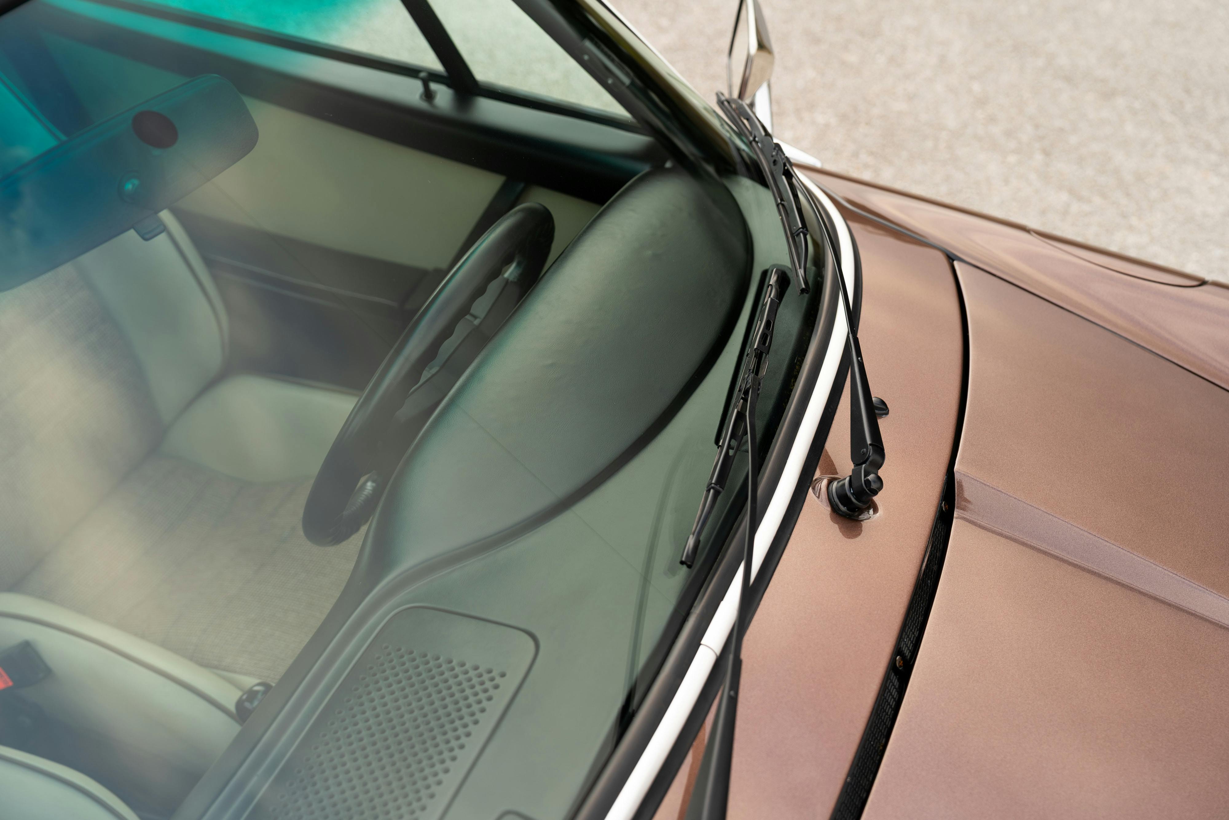 1975 Porsche 911 Carrera 2.7 in Copper Brown Metallic with beige interior for auction on Bring a Trailer.