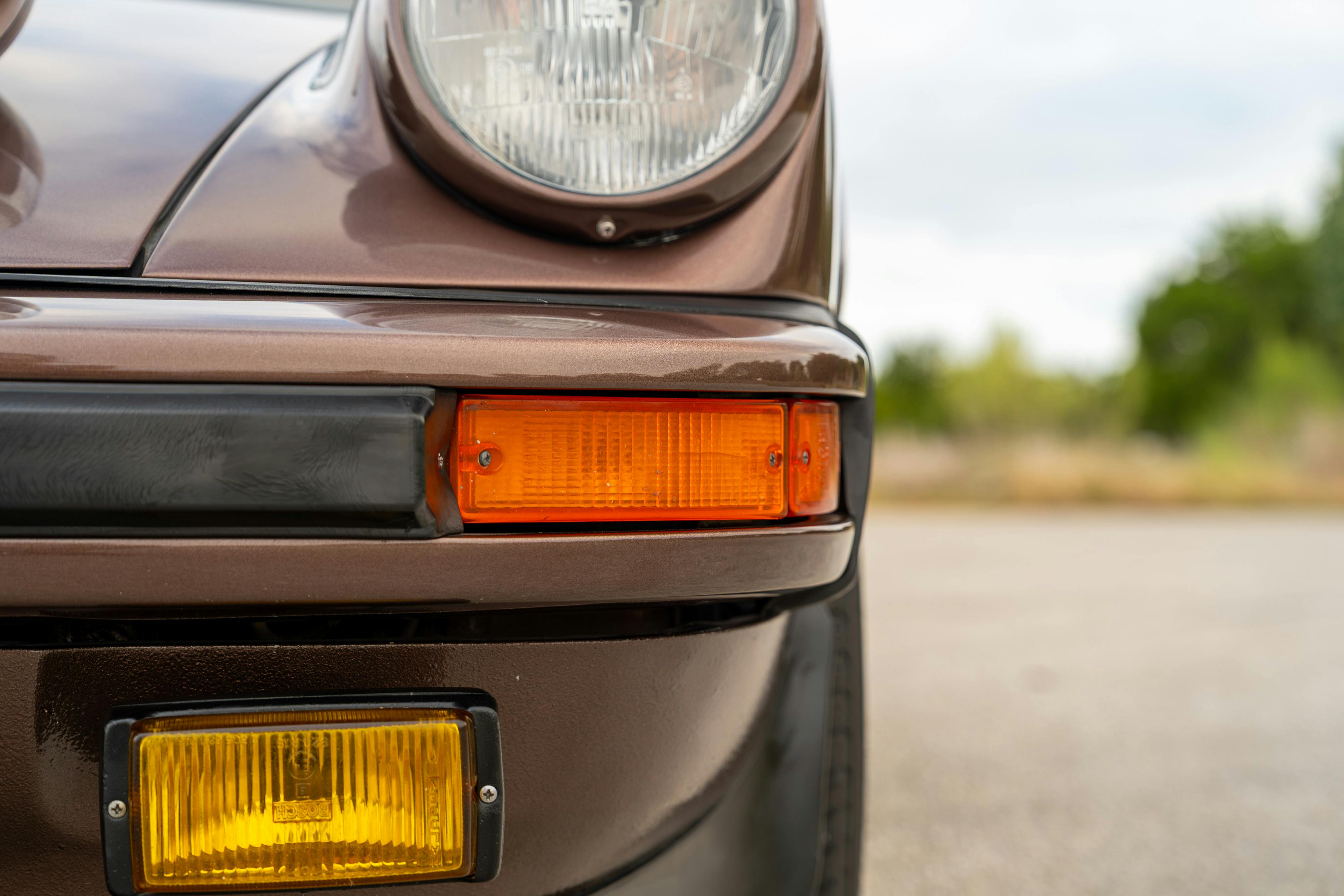 1975 Porsche 911 Carrera 2.7 in Copper Brown Metallic with beige interior for auction on Bring a Trailer.