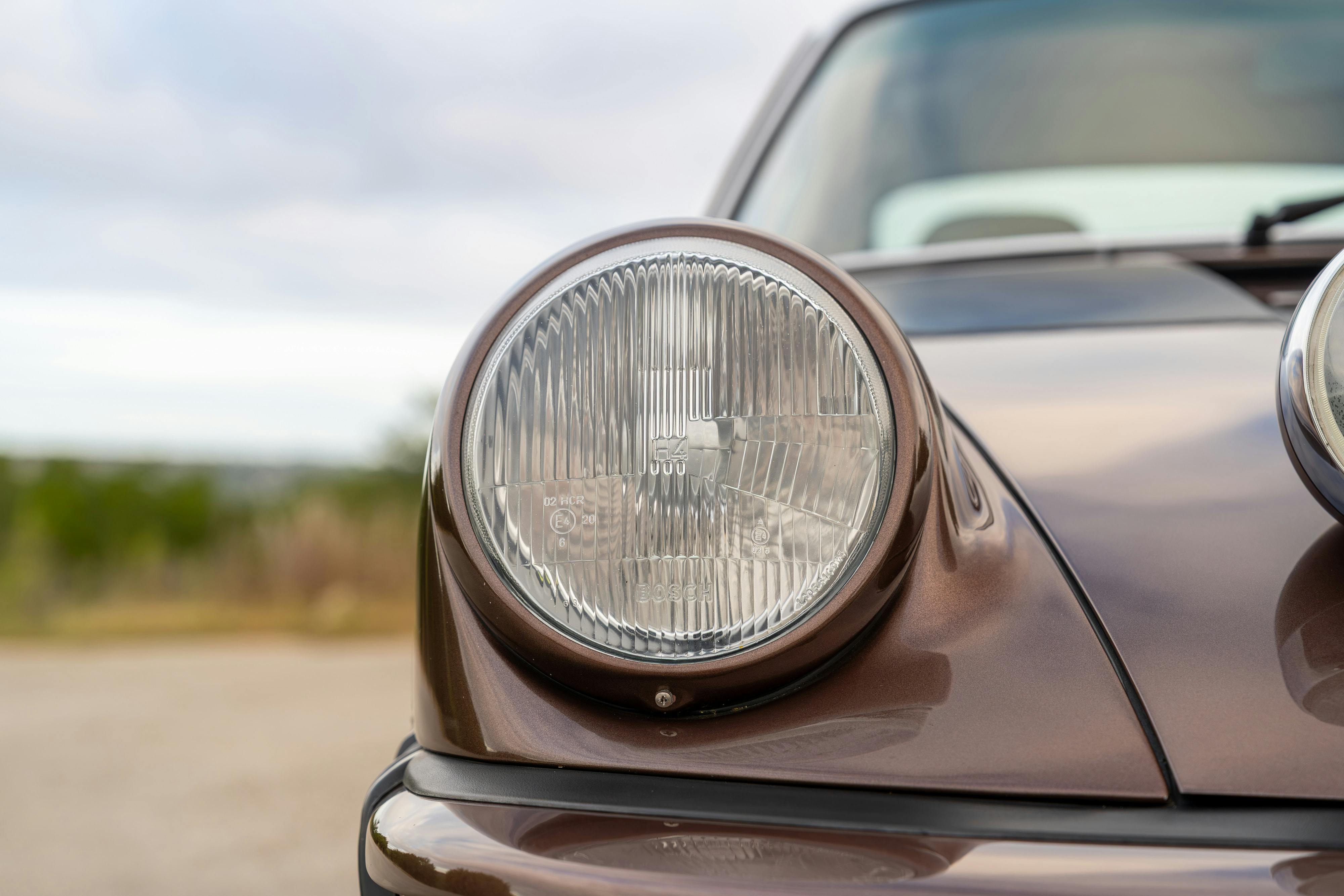 1975 Porsche 911 Carrera 2.7 in Copper Brown Metallic with beige interior for auction on Bring a Trailer.