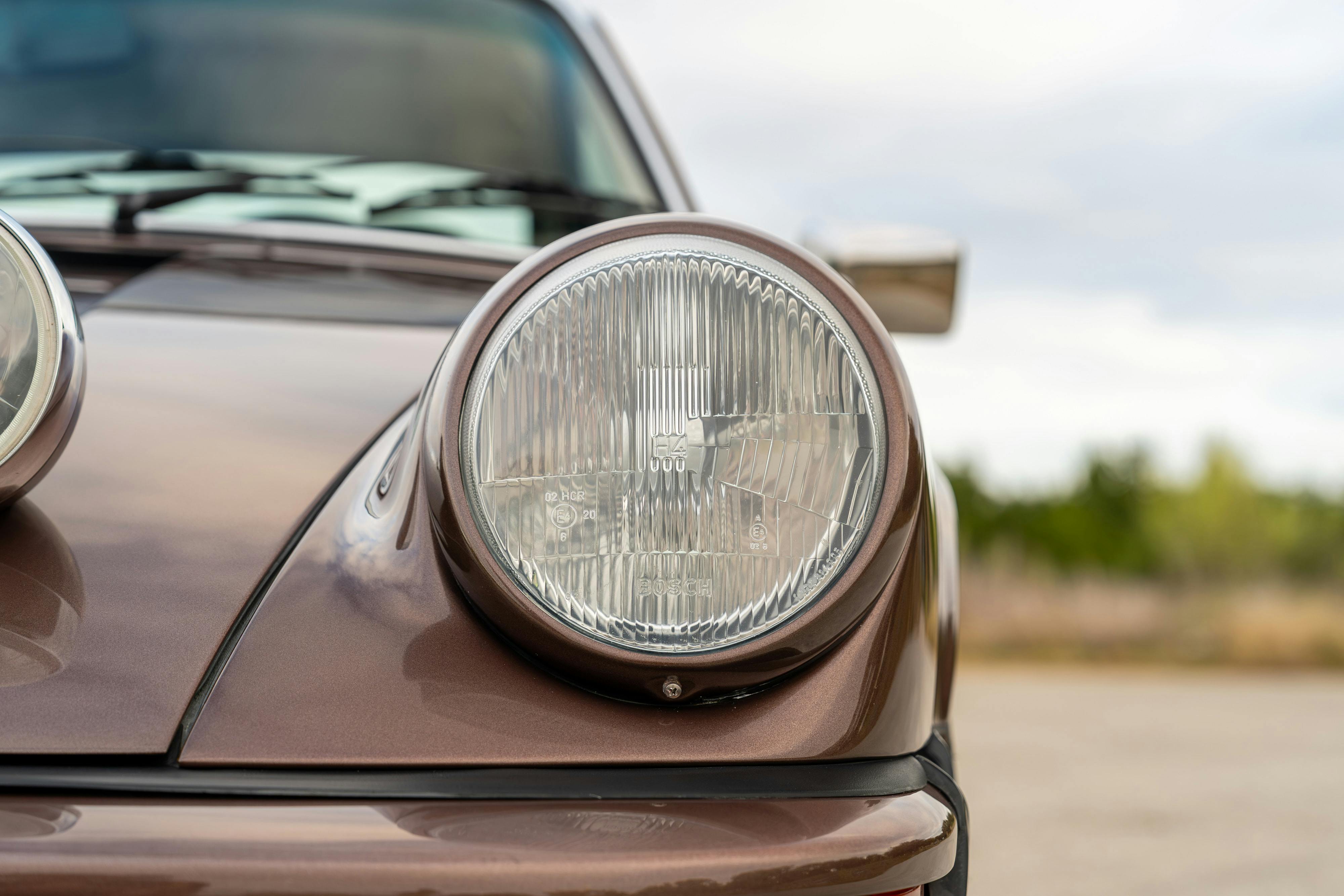 1975 Porsche 911 Carrera 2.7 in Copper Brown Metallic with beige interior for auction on Bring a Trailer.