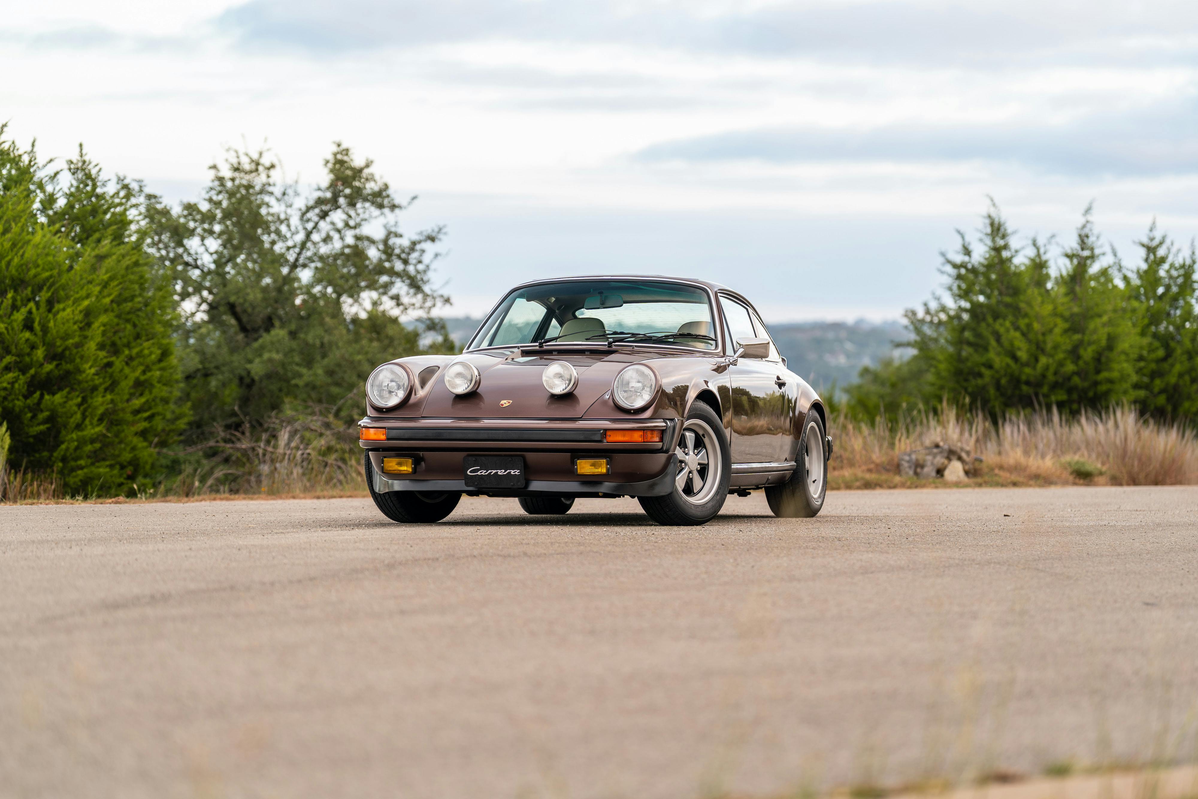 1975 Porsche 911 Carrera 2.7 in Copper Brown Metallic with beige interior for auction on Bring a Trailer.