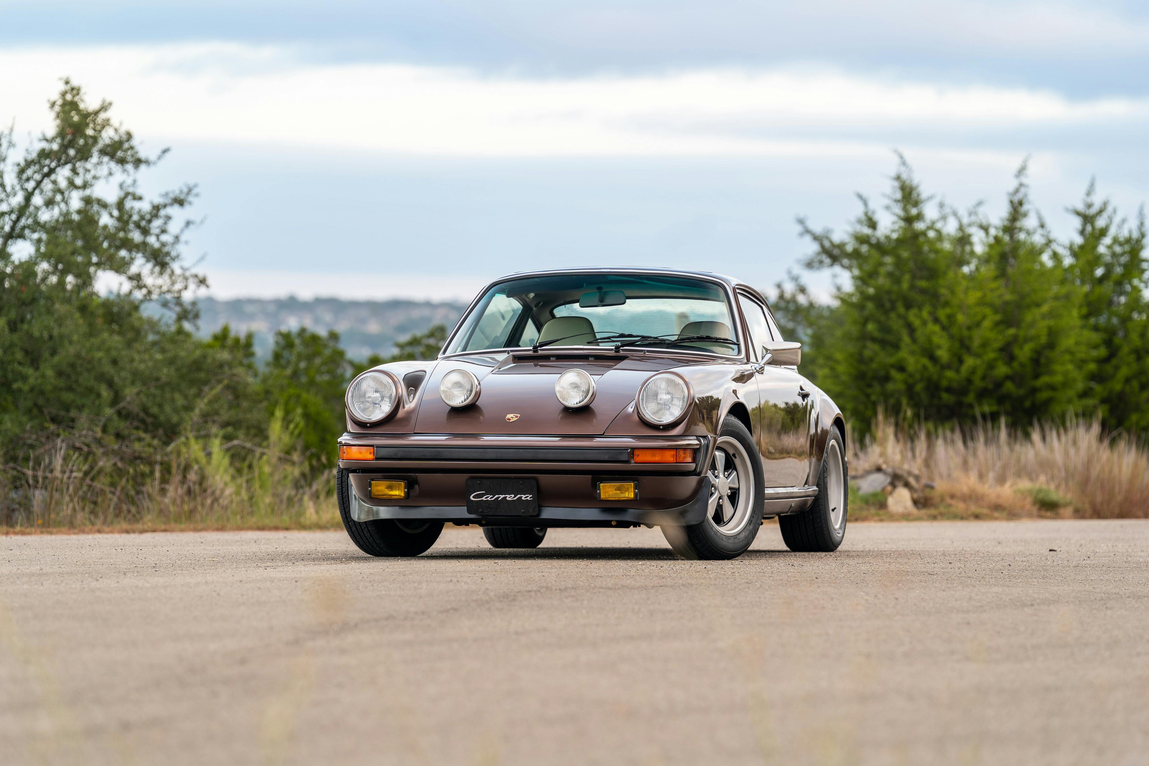 1975 Porsche 911 Carrera 2.7 in Copper Brown Metallic with beige interior for auction on Bring a Trailer.