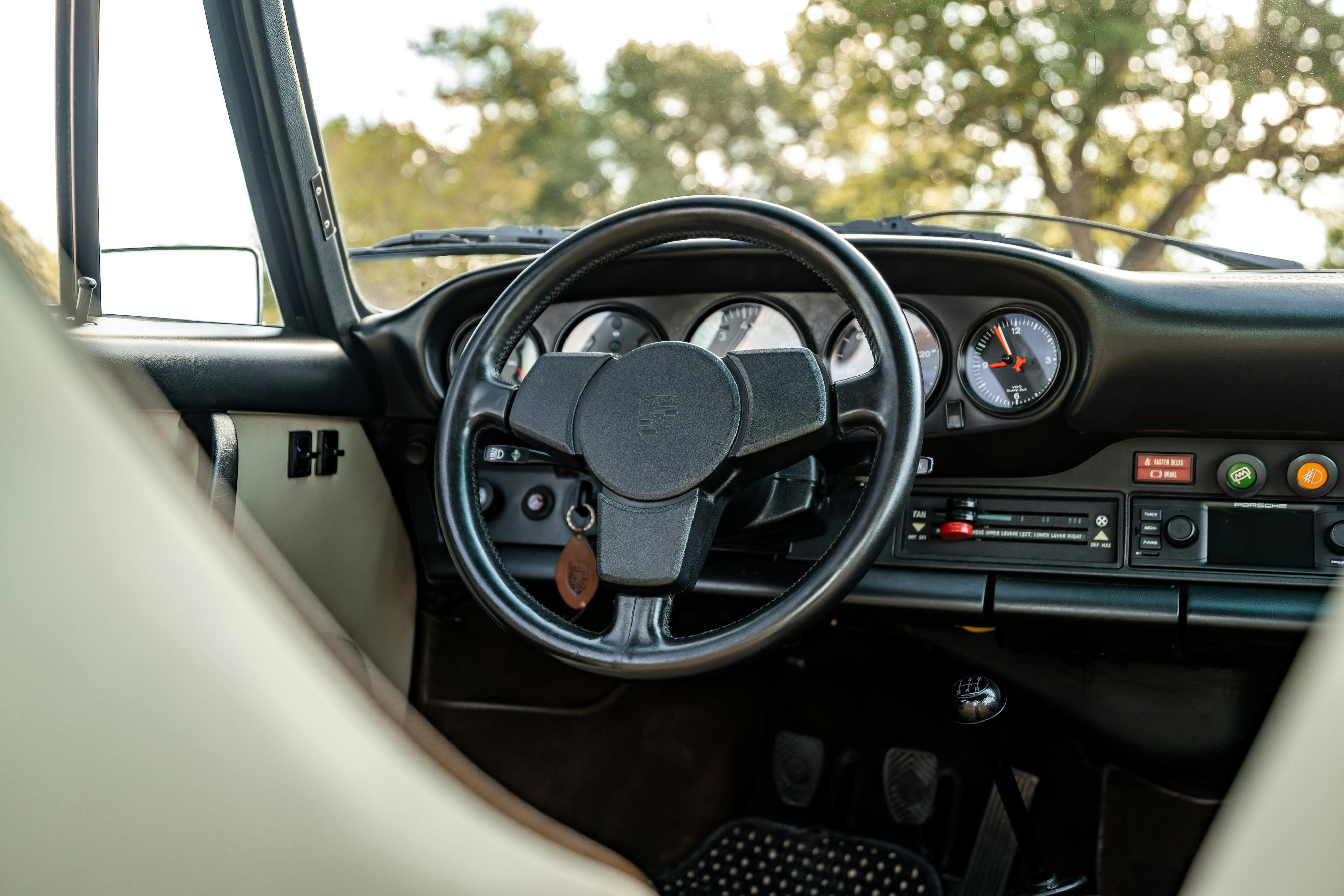 1975 Porsche 911 Carrera 2.7 in Copper Brown Metallic with beige interior for auction on Bring a Trailer.