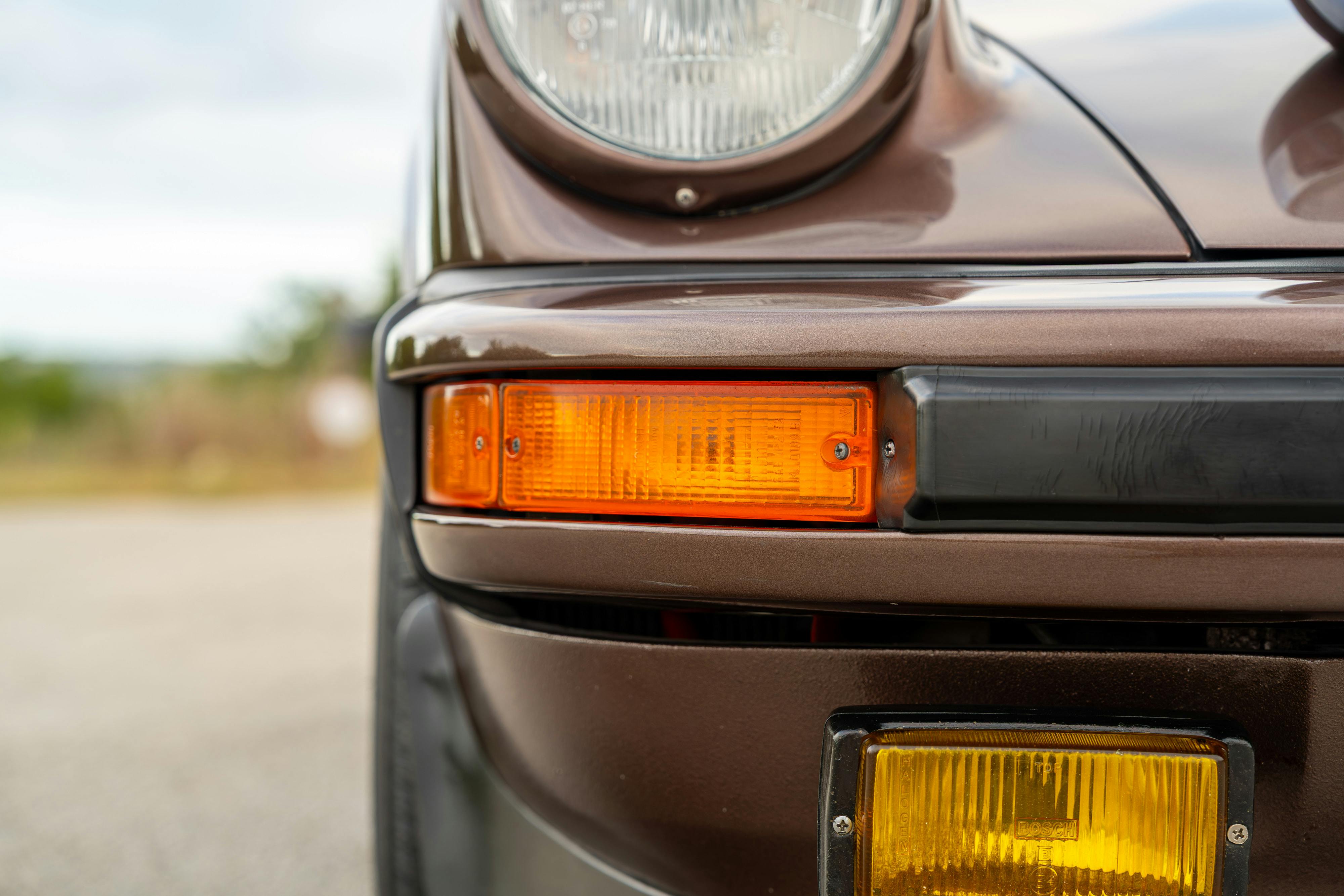 1975 Porsche 911 Carrera 2.7 in Copper Brown Metallic with beige interior for auction on Bring a Trailer.