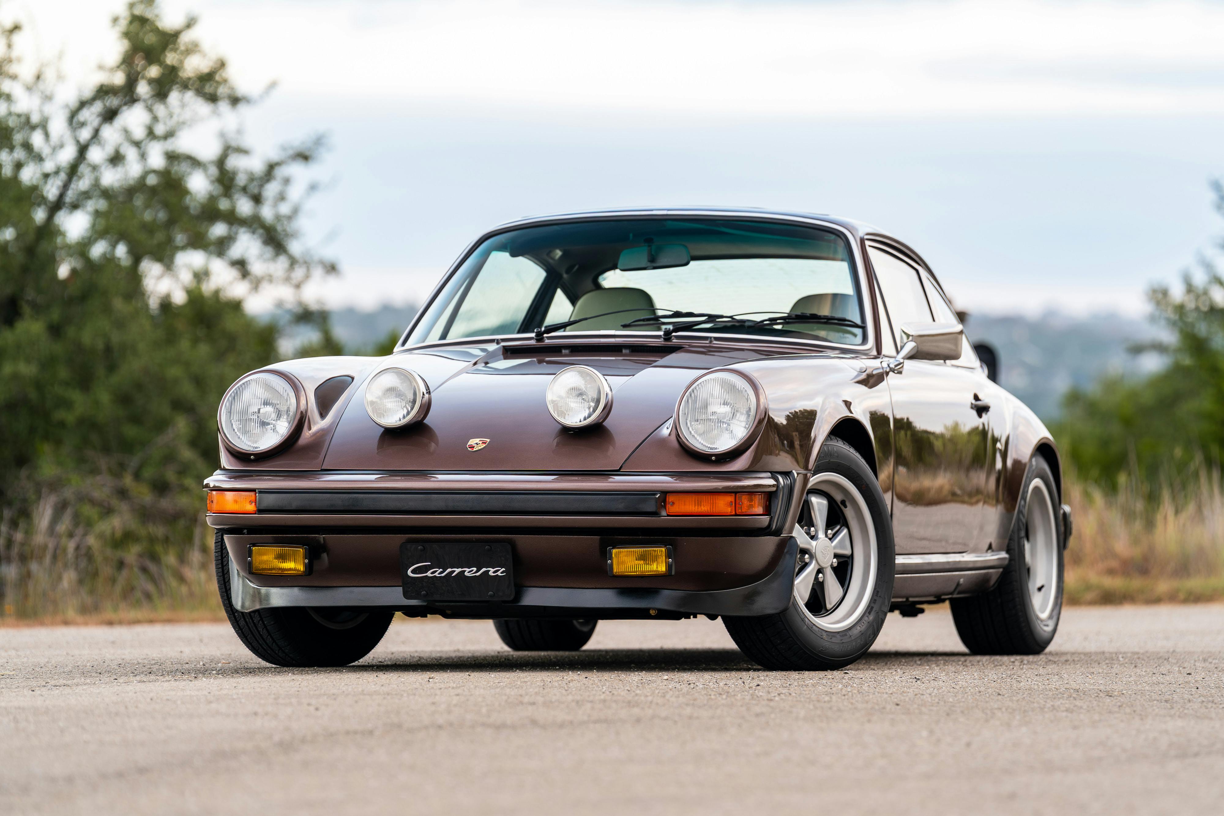 1975 Porsche 911 Carrera 2.7 in Copper Brown Metallic with beige interior for auction on Bring a Trailer.