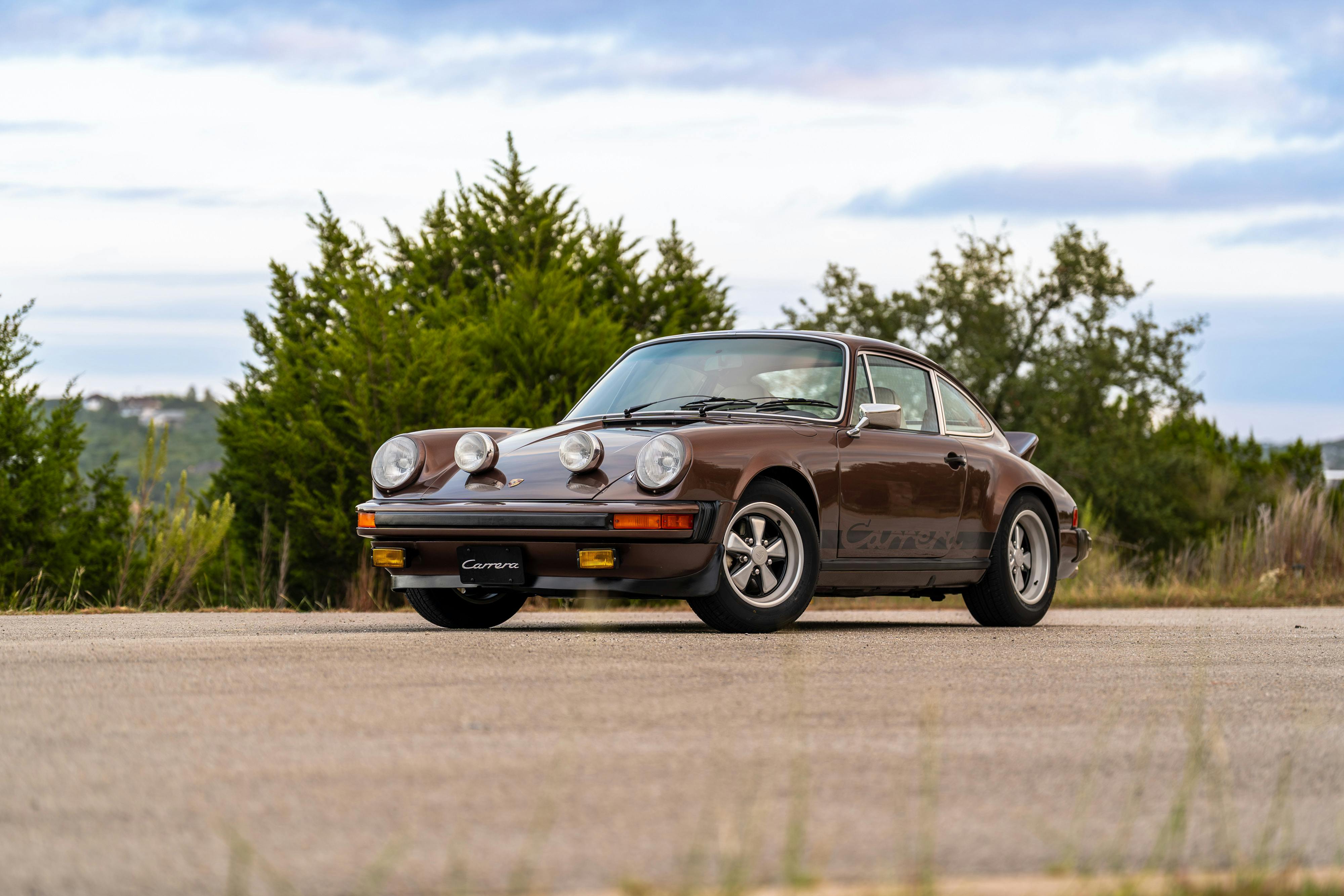 1975 Porsche 911 Carrera 2.7 in Copper Brown Metallic with beige interior for auction on Bring a Trailer.