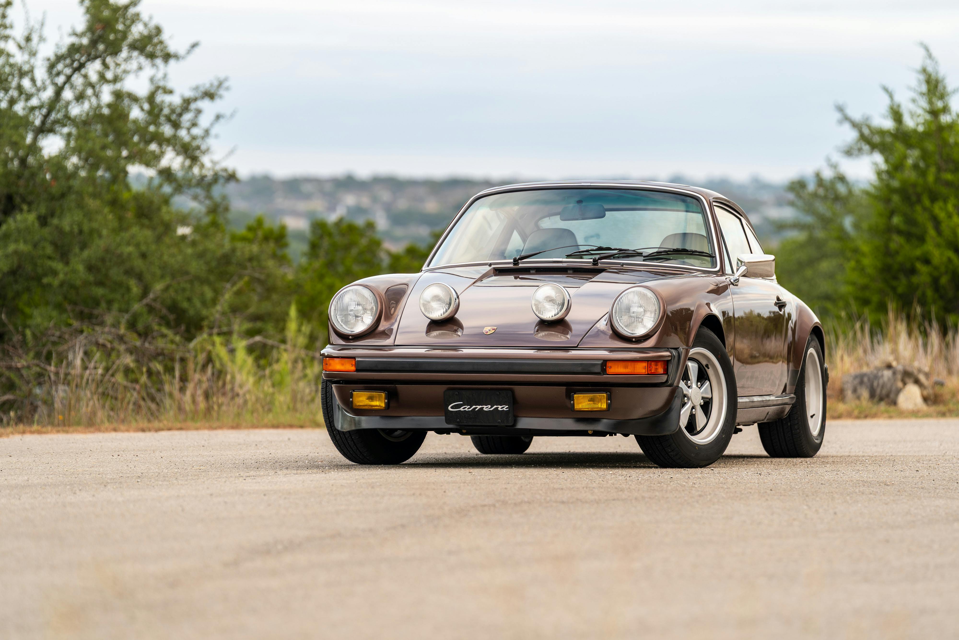 1975 Porsche 911 Carrera 2.7 in Copper Brown Metallic with beige interior for auction on Bring a Trailer.