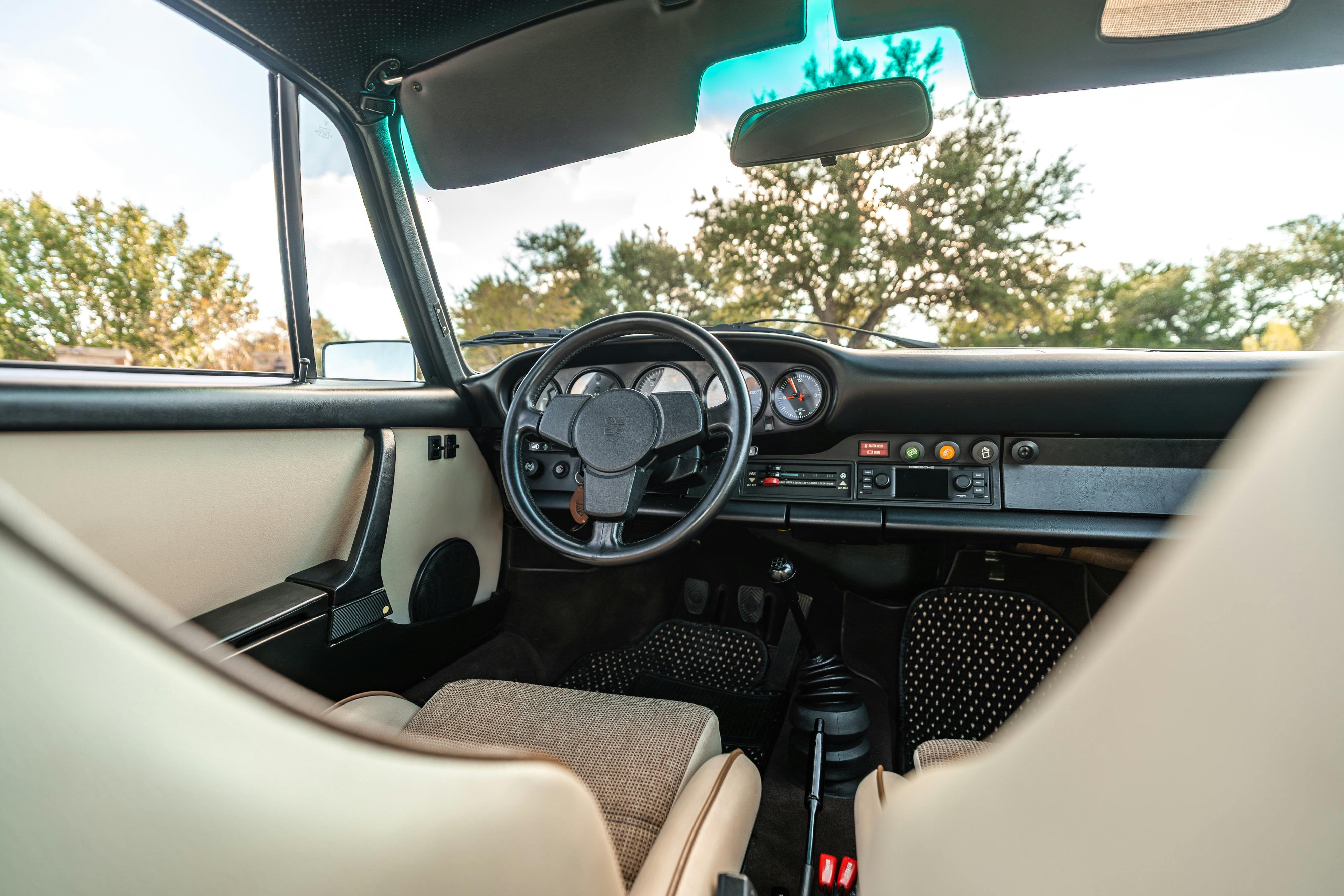 1975 Porsche 911 Carrera 2.7 in Copper Brown Metallic with beige interior for auction on Bring a Trailer.