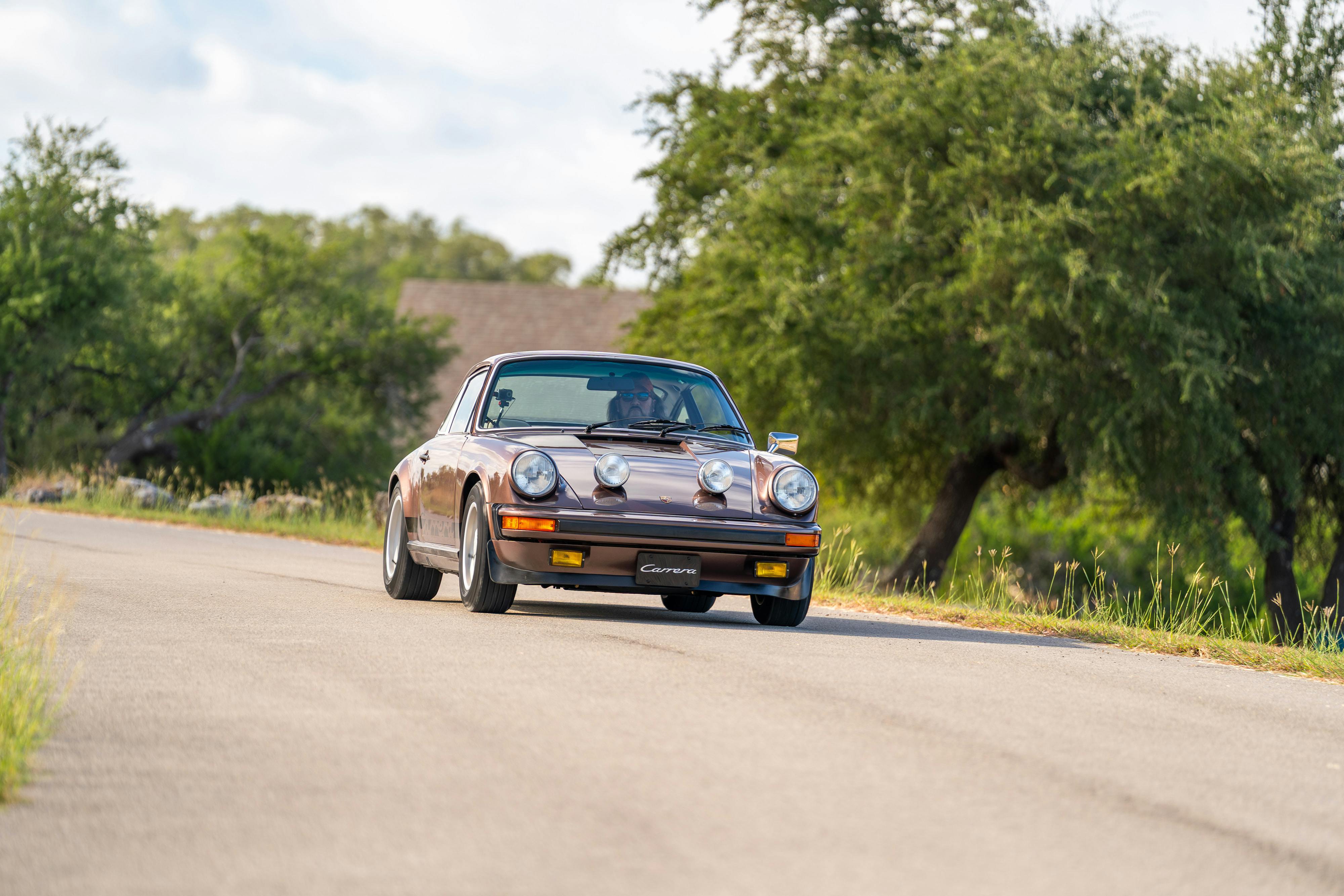 1975 Porsche 911 Carrera 2.7 in Copper Brown Metallic with beige interior for auction on Bring a Trailer.