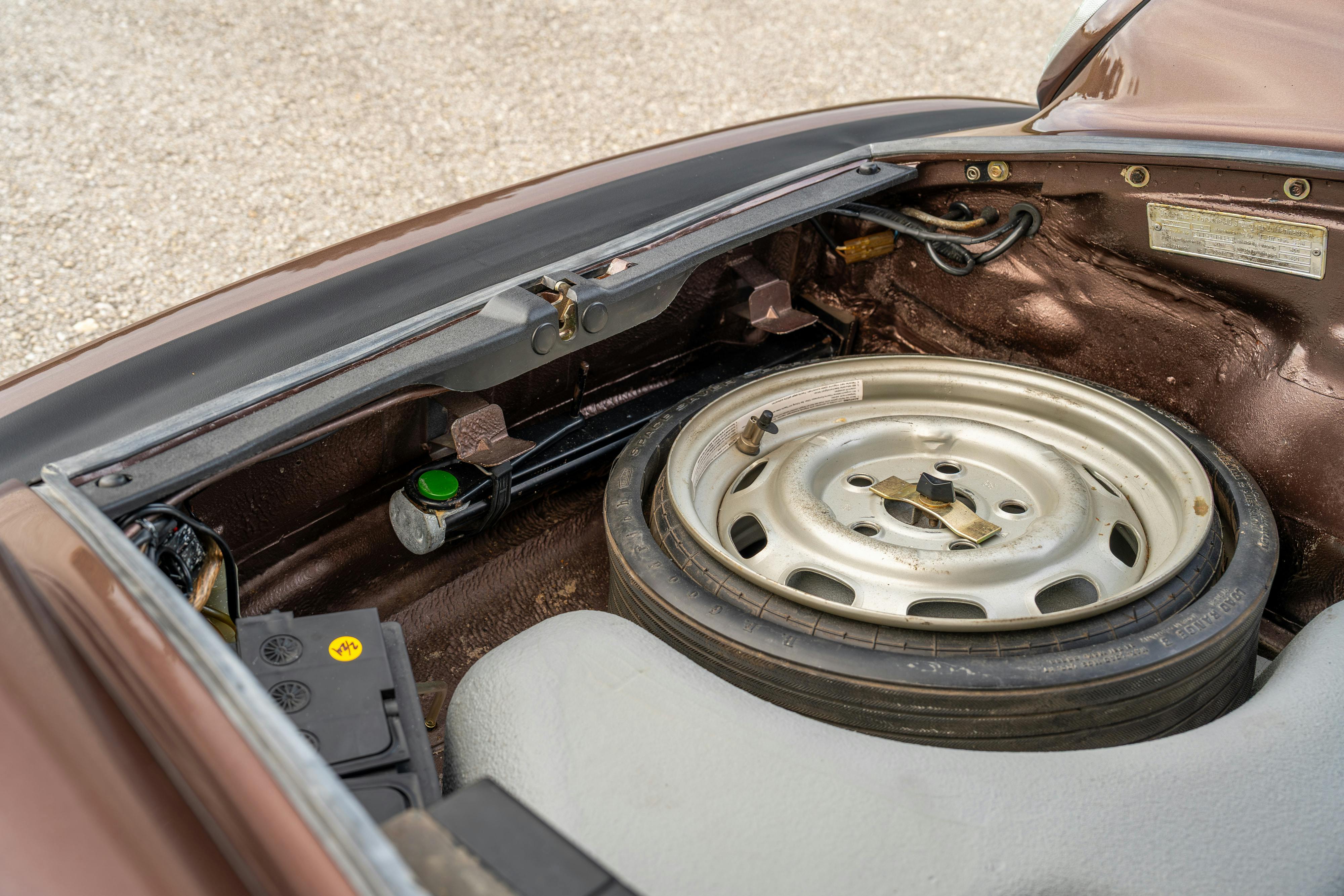 1975 Porsche 911 Carrera 2.7 in Copper Brown Metallic with beige interior for auction on Bring a Trailer.