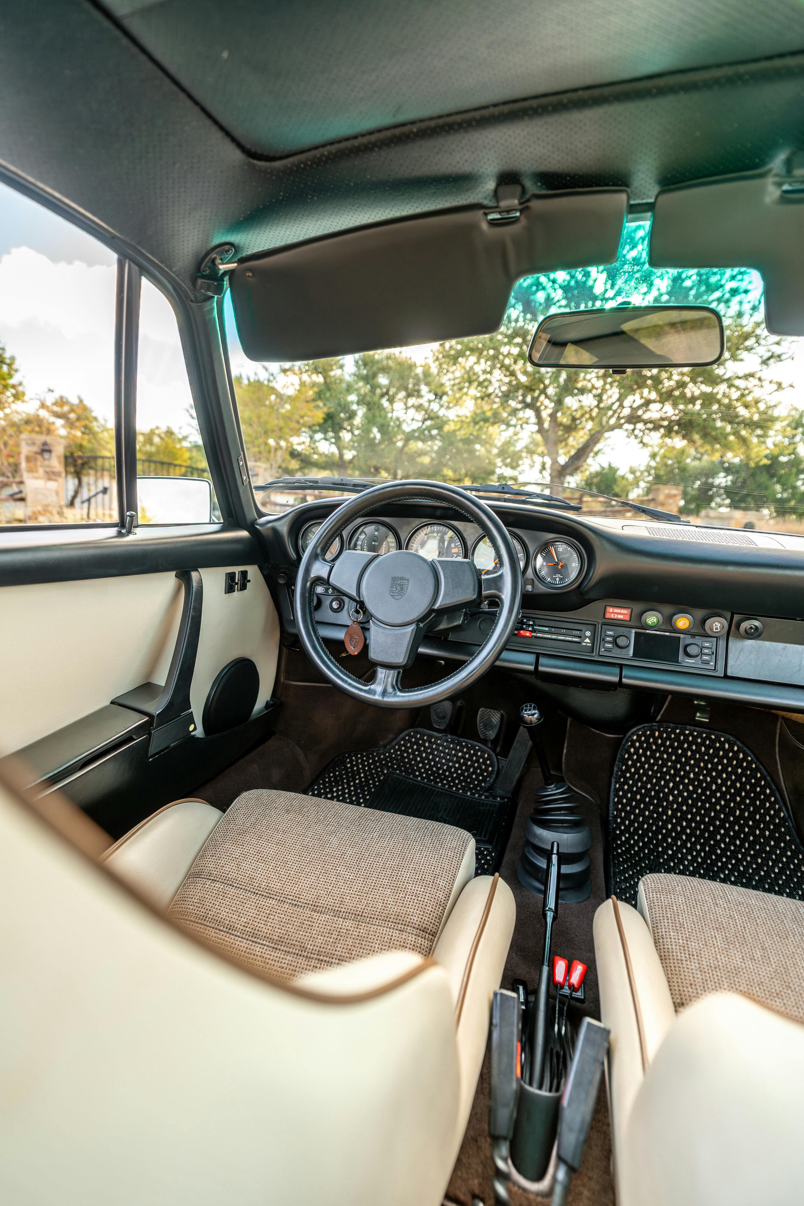 1975 Porsche 911 Carrera 2.7 in Copper Brown Metallic with beige interior for auction on Bring a Trailer.