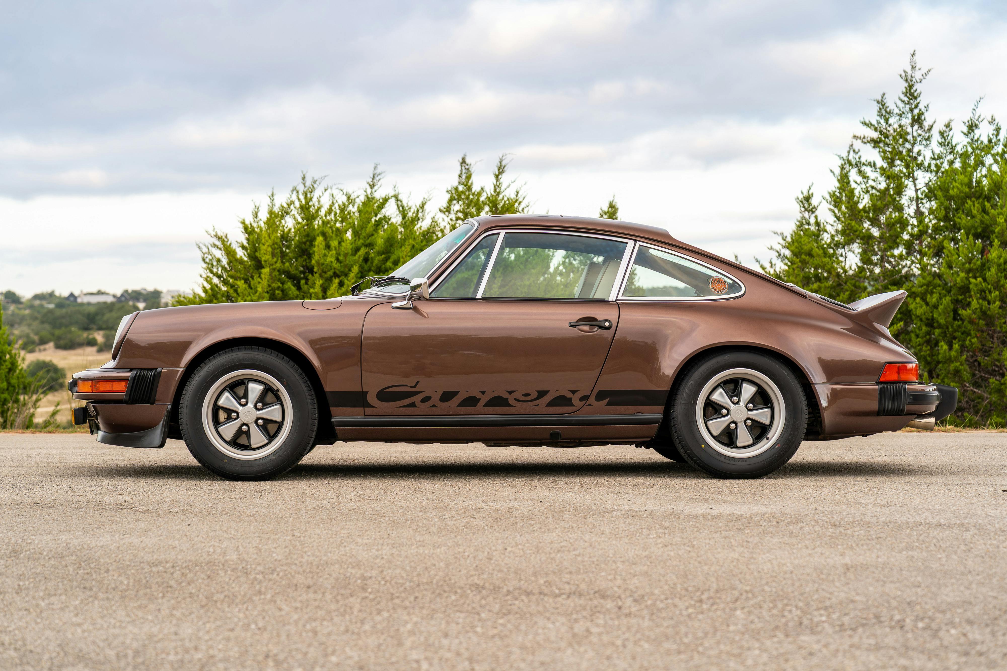 1975 Porsche 911 Carrera 2.7 in Copper Brown Metallic with beige interior for auction on Bring a Trailer.