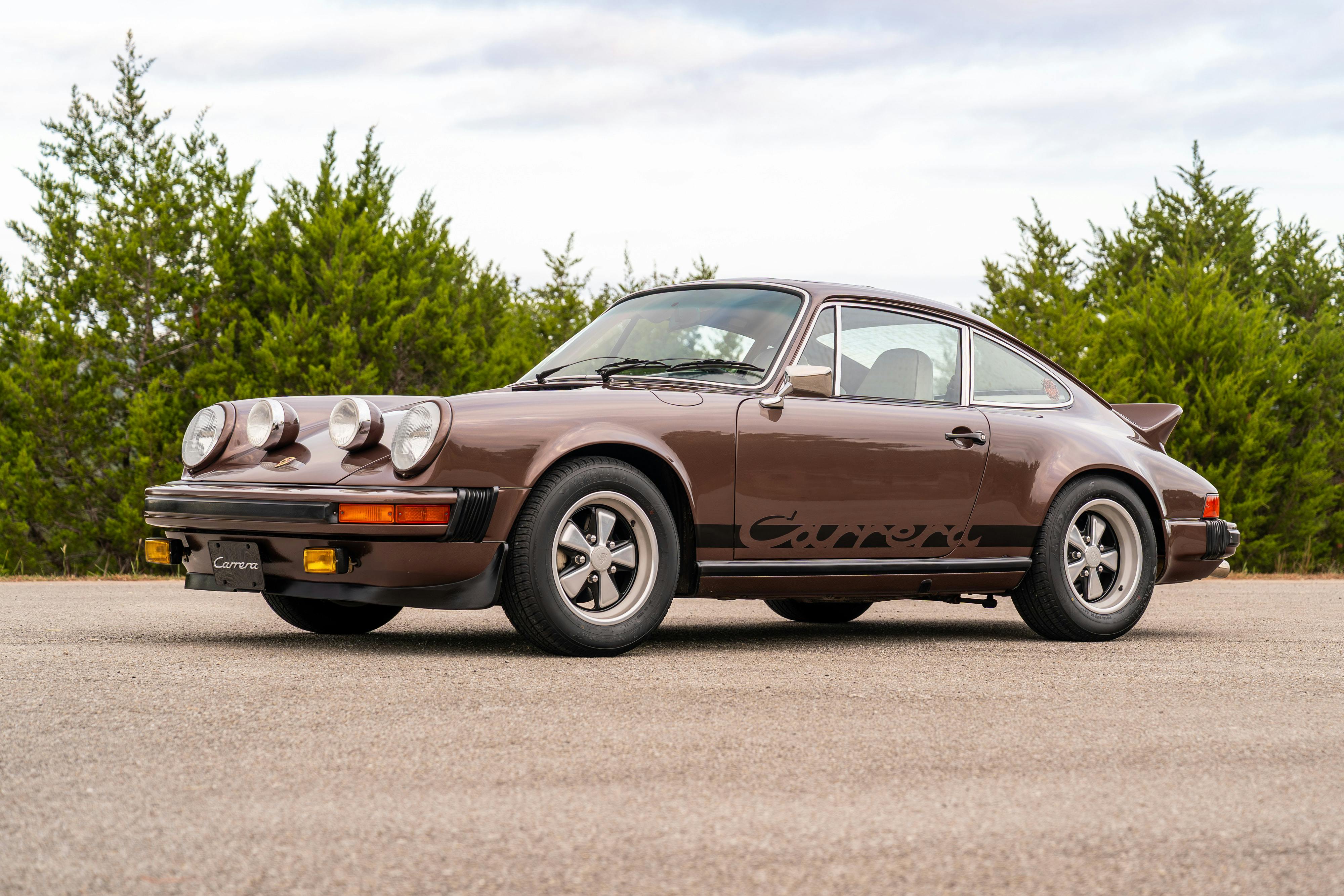 1975 Porsche 911 Carrera 2.7 in Copper Brown Metallic with beige interior for auction on Bring a Trailer.