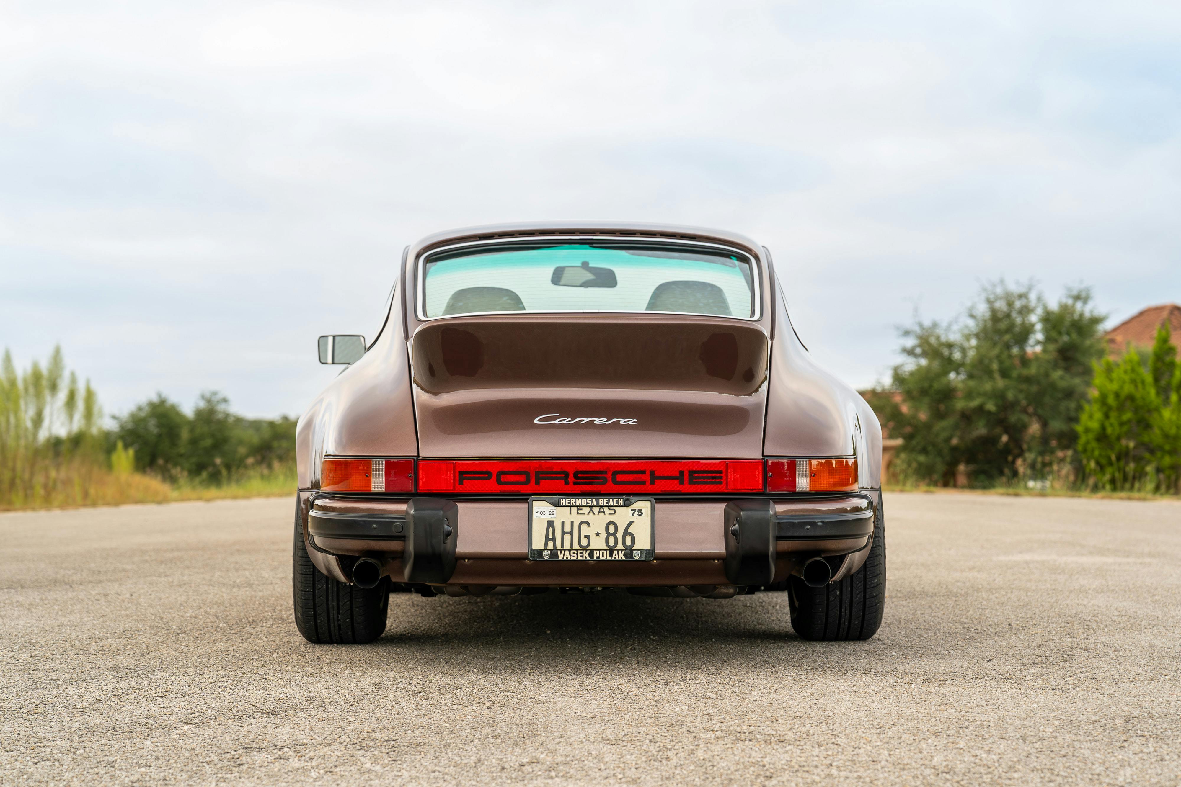 1975 Porsche 911 Carrera 2.7 in Copper Brown Metallic with beige interior for auction on Bring a Trailer.