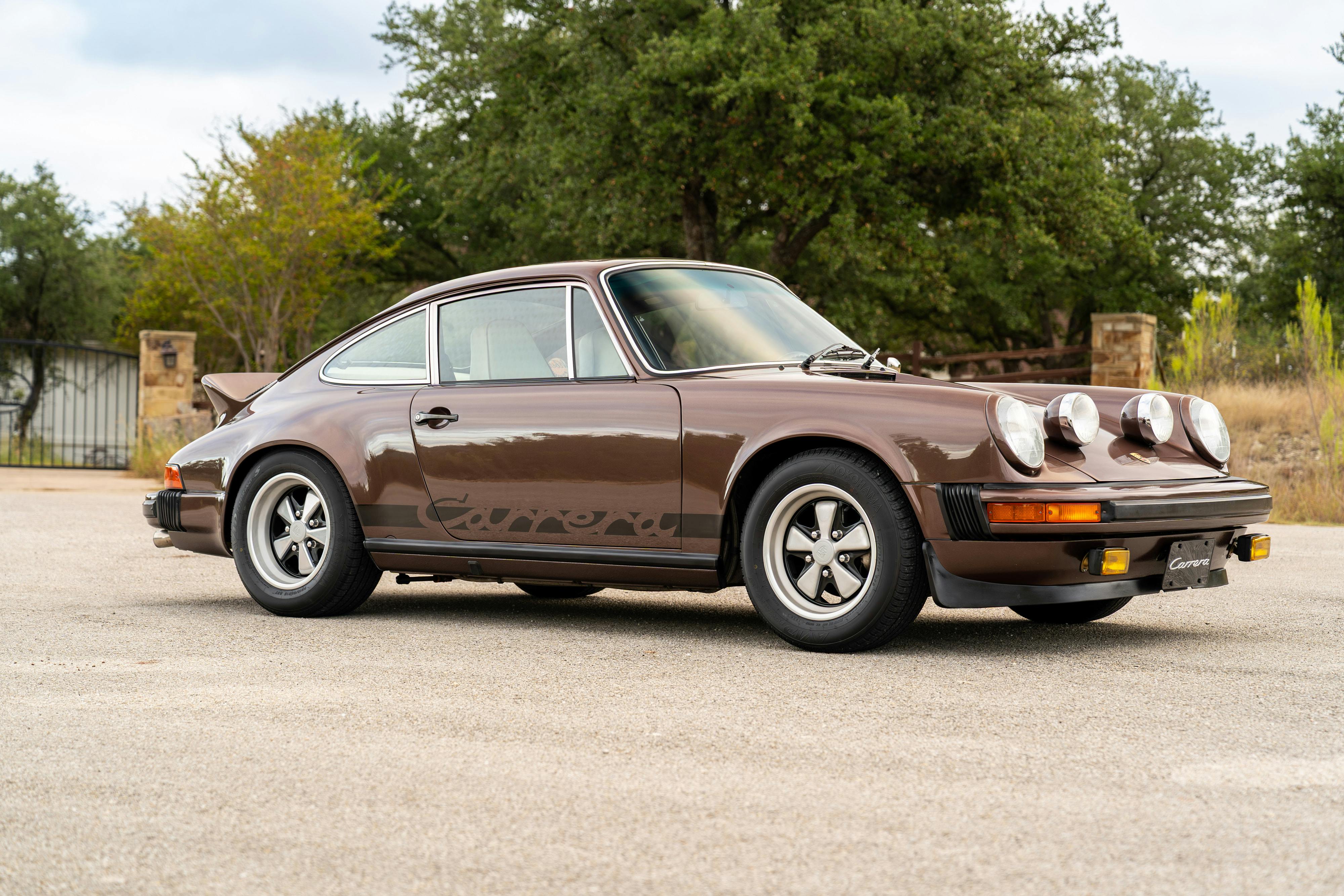 1975 Porsche 911 Carrera 2.7 in Copper Brown Metallic with beige interior for auction on Bring a Trailer.