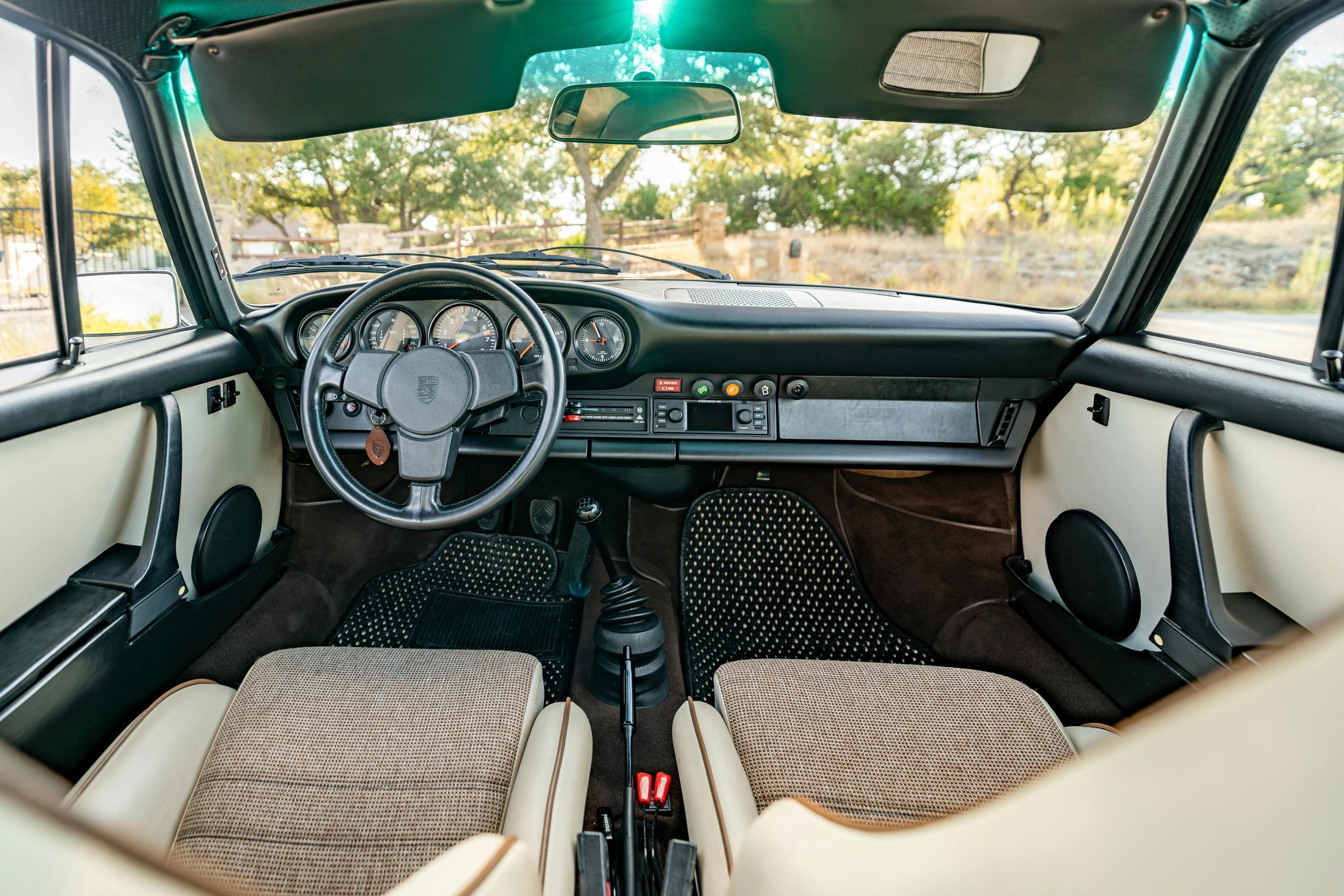 1975 Porsche 911 Carrera 2.7 in Copper Brown Metallic with beige interior for auction on Bring a Trailer.