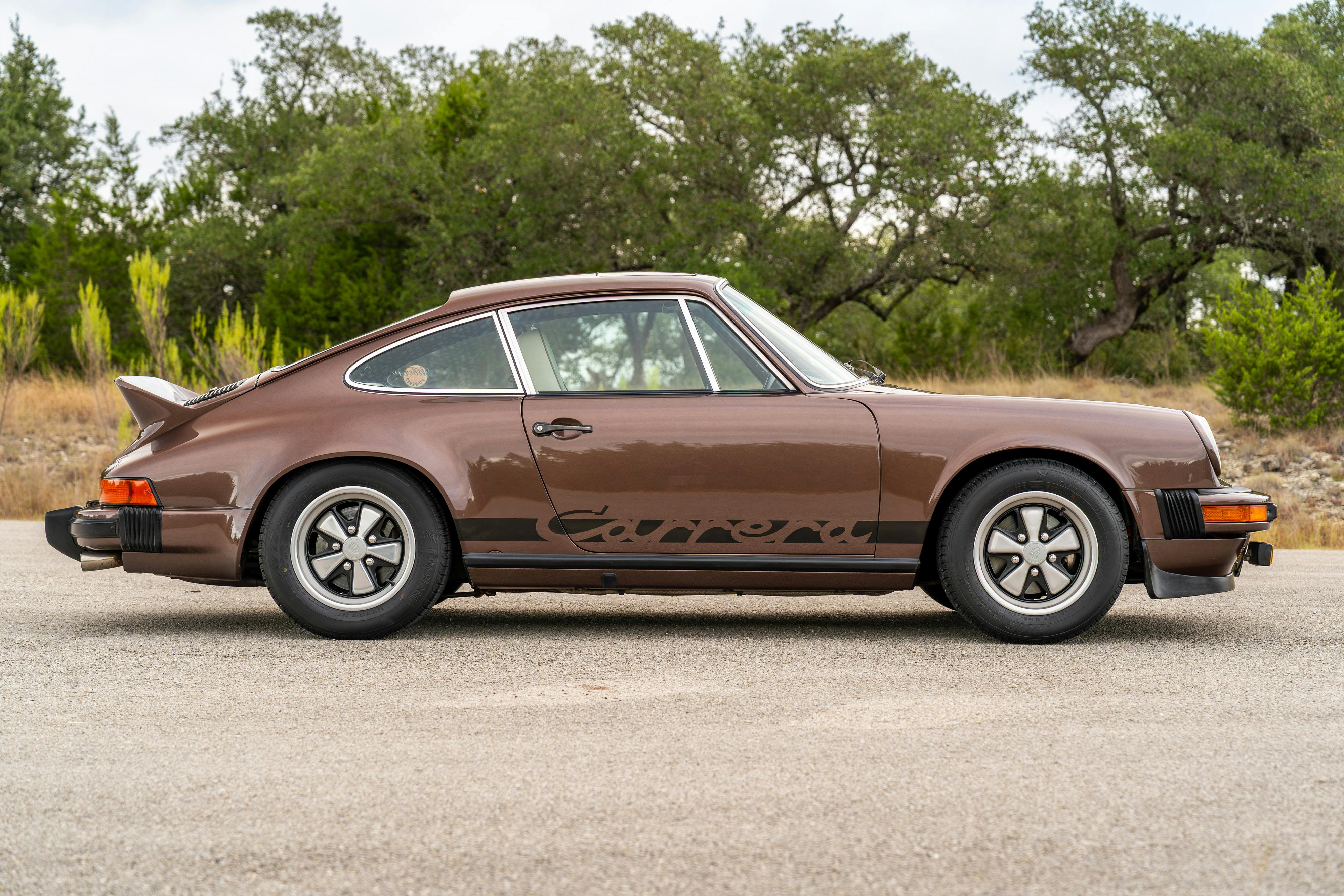 1975 Porsche 911 Carrera 2.7 in Copper Brown Metallic with beige interior for auction on Bring a Trailer.