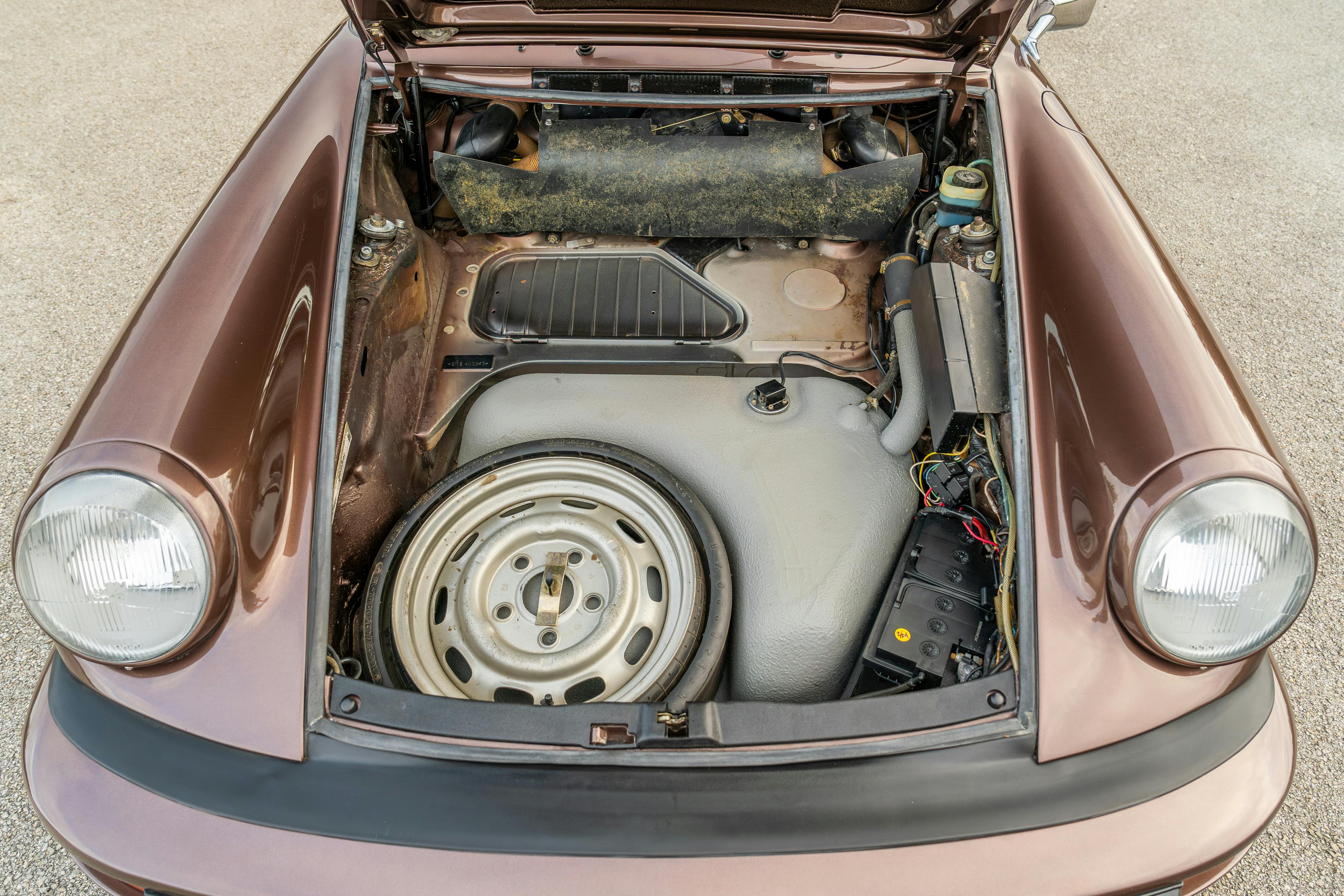 1975 Porsche 911 Carrera 2.7 in Copper Brown Metallic with beige interior for auction on Bring a Trailer.