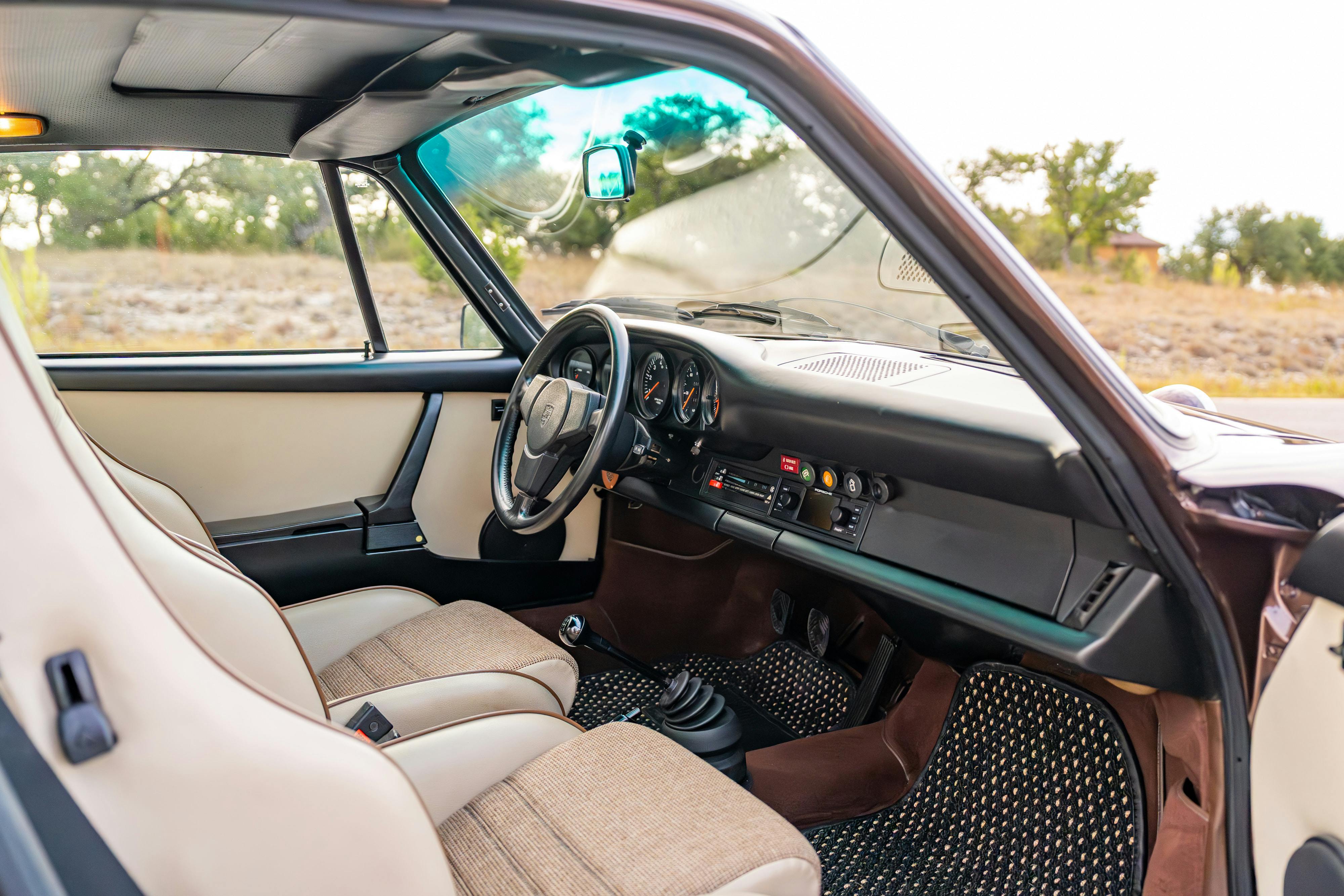 1975 Porsche 911 Carrera 2.7 in Copper Brown Metallic with beige interior for auction on Bring a Trailer.