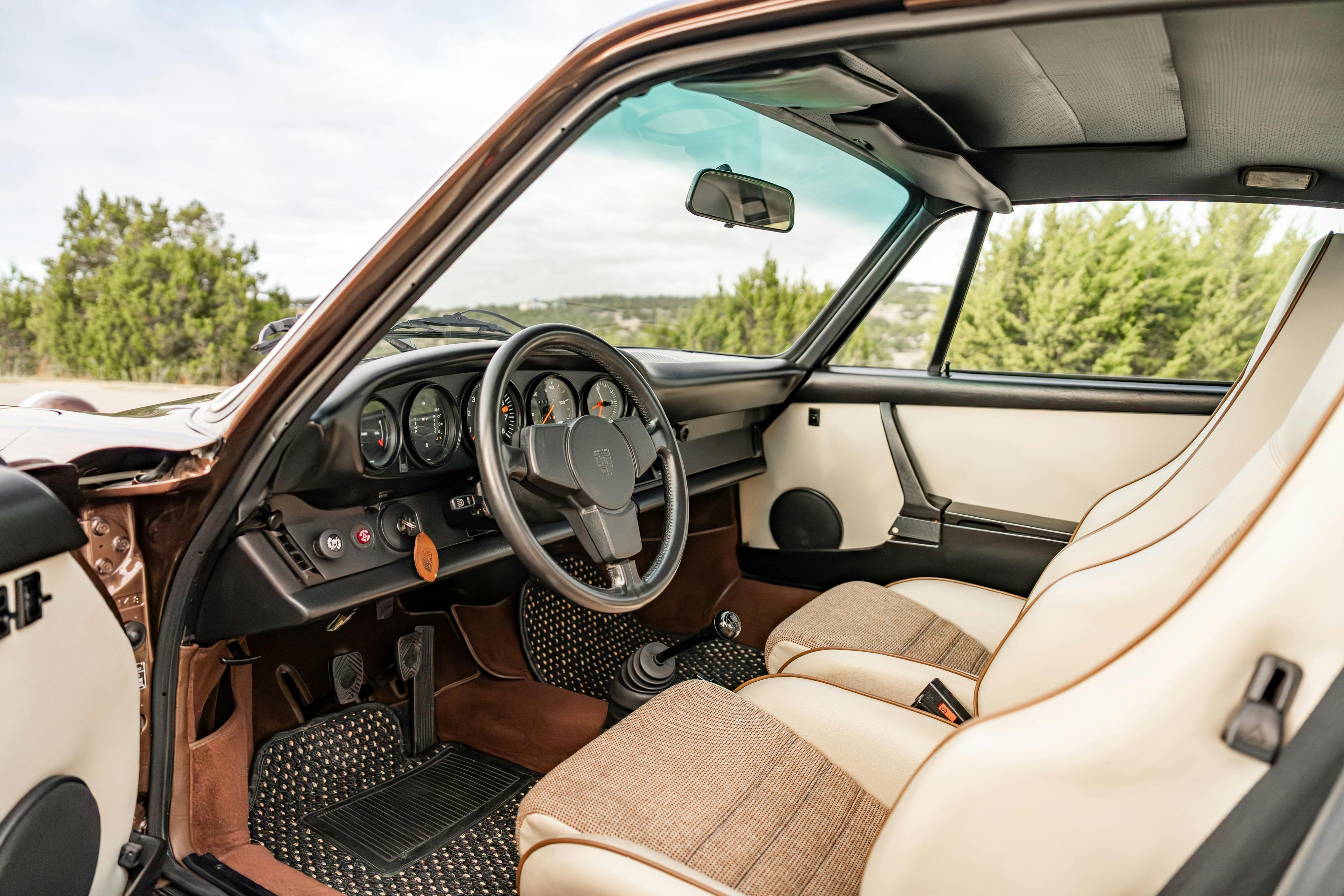 1975 Porsche 911 Carrera 2.7 in Copper Brown Metallic with beige interior for auction on Bring a Trailer.
