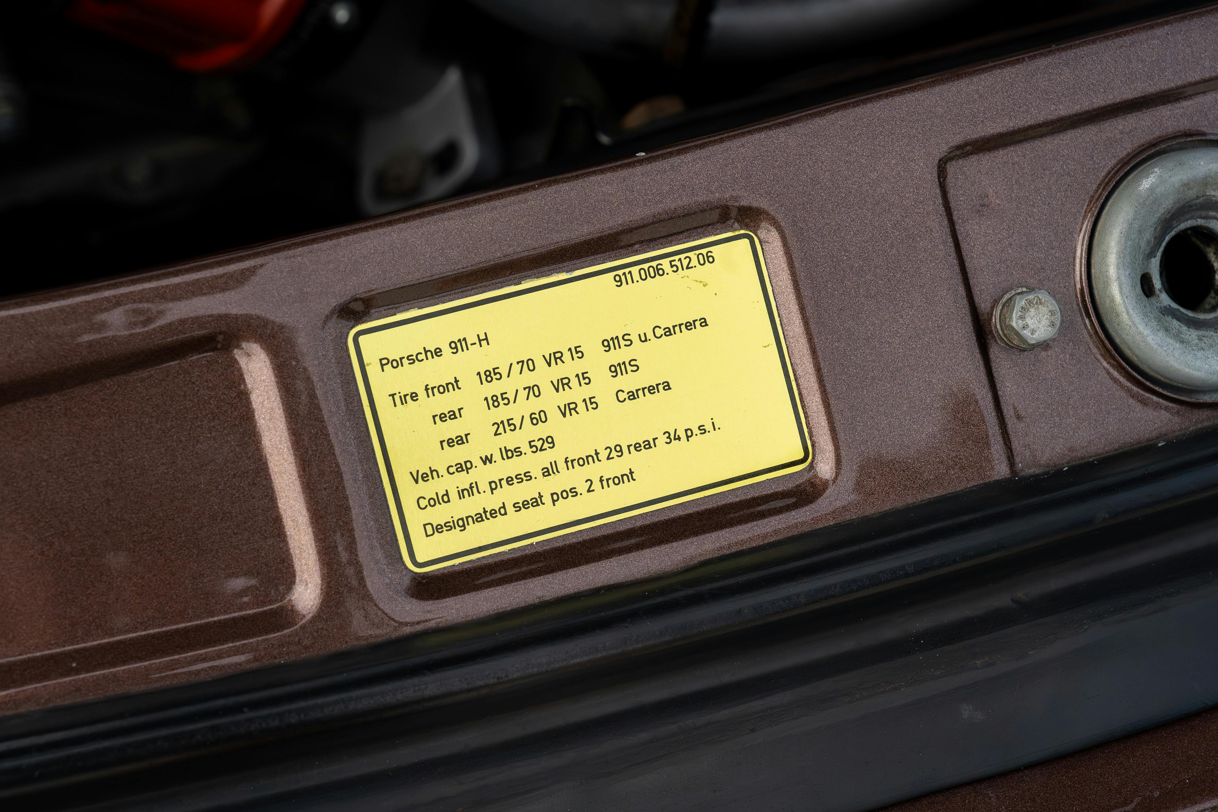 1975 Porsche 911 Carrera 2.7 in Copper Brown Metallic with beige interior for auction on Bring a Trailer.