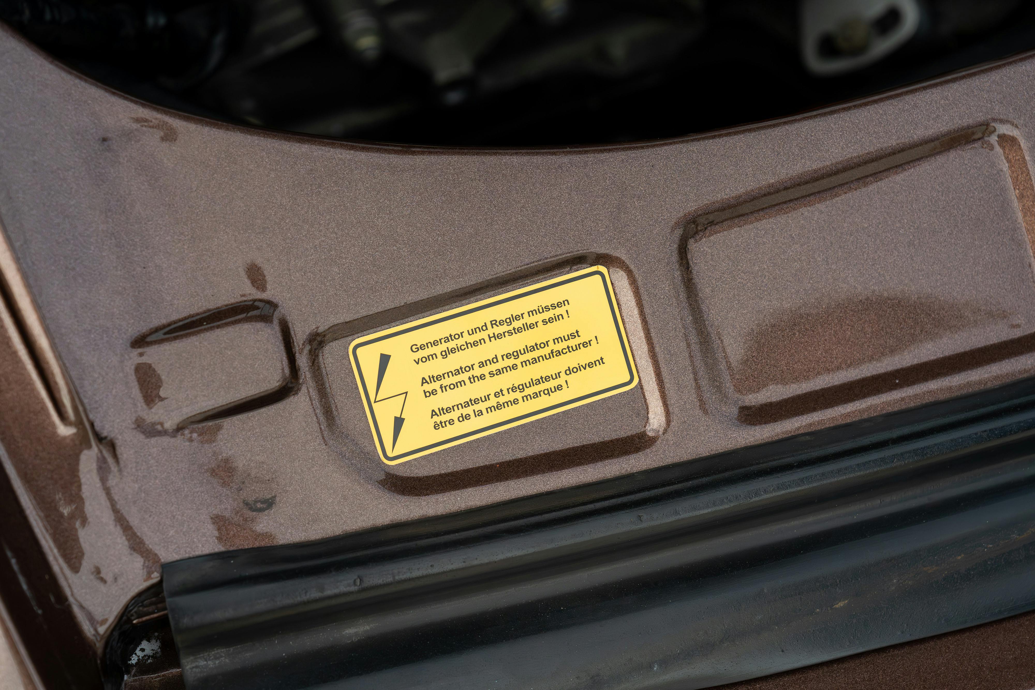 1975 Porsche 911 Carrera 2.7 in Copper Brown Metallic with beige interior for auction on Bring a Trailer.