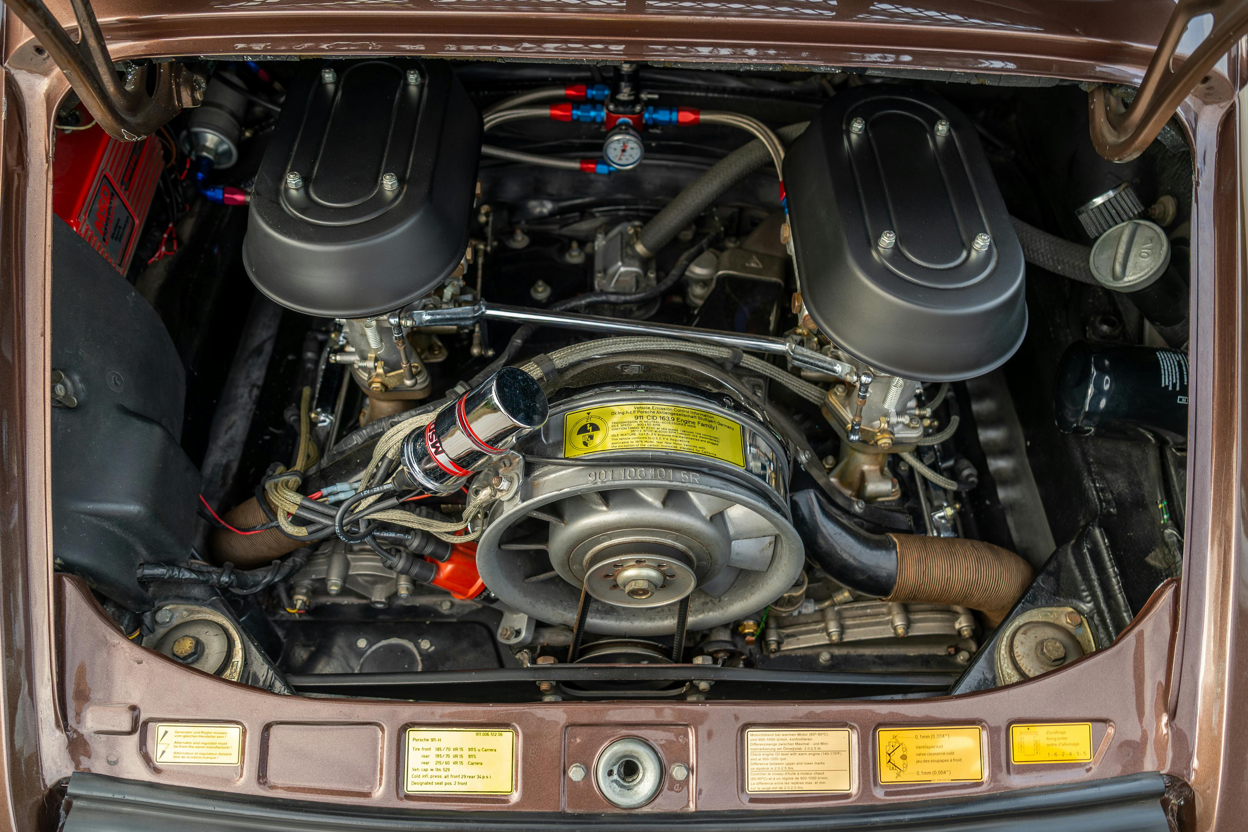 1975 Porsche 911 Carrera 2.7 in Copper Brown Metallic with beige interior for auction on Bring a Trailer.
