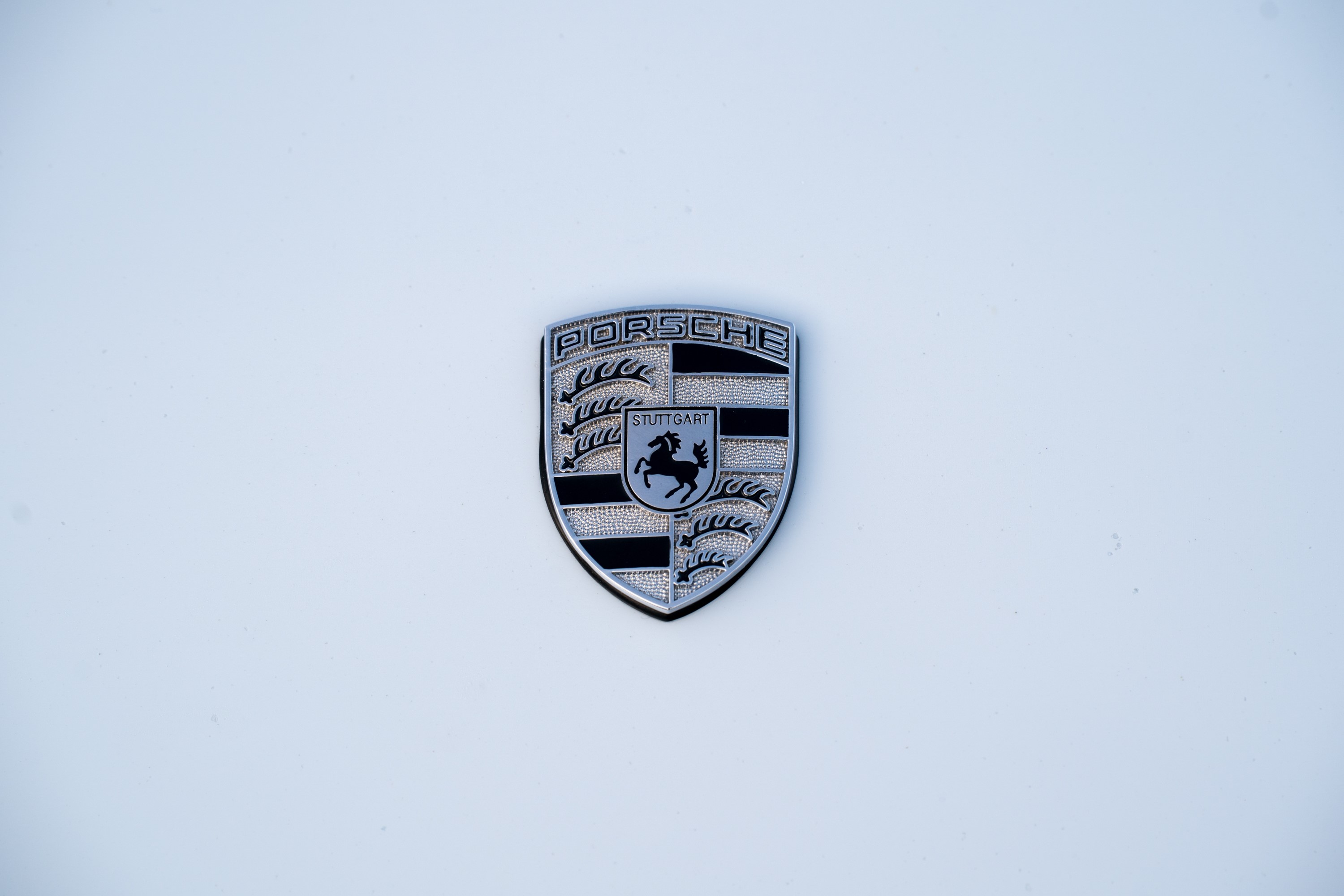 Front badge on a White Porsche 993