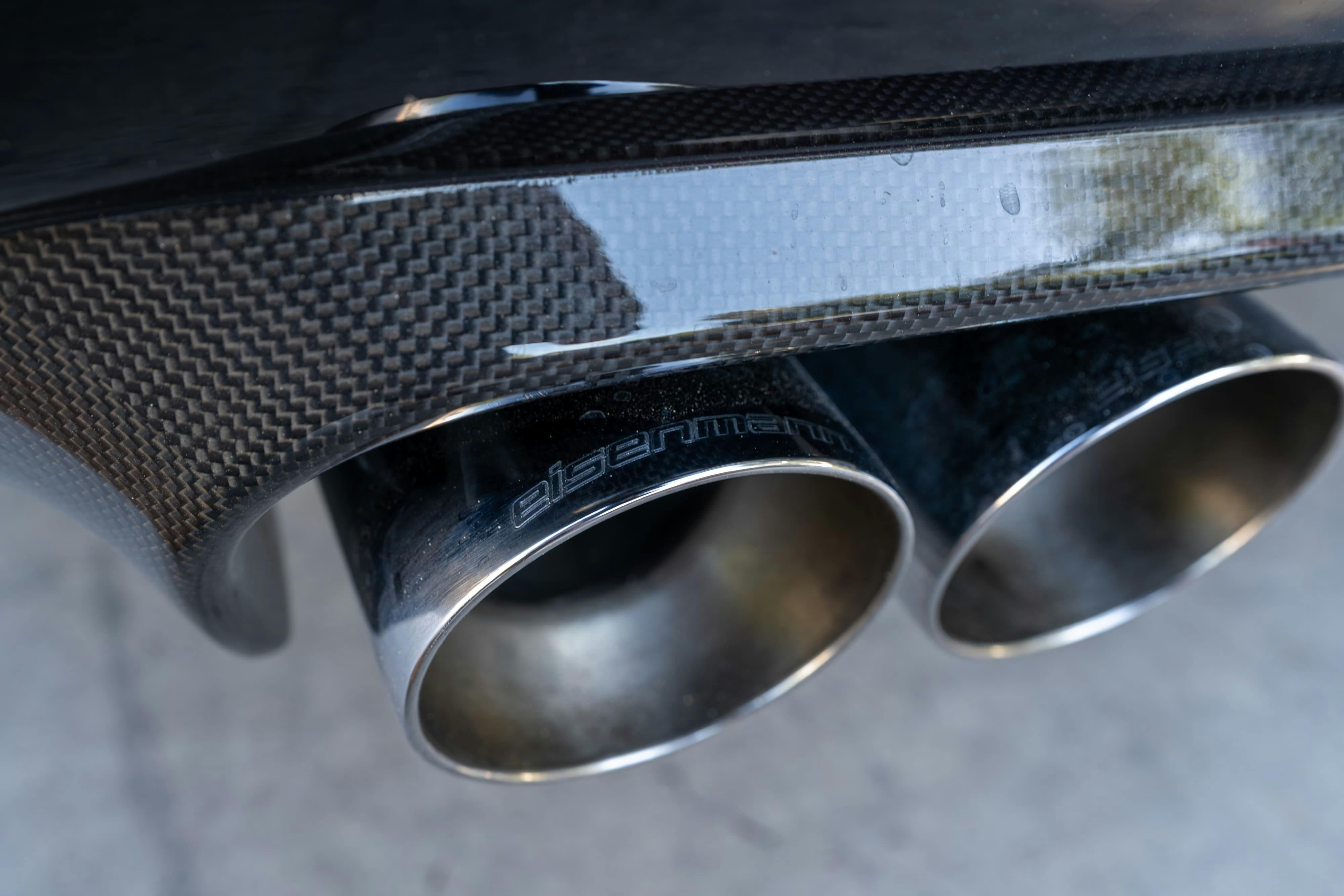 Eisenmann exhaust on an Individual Carbon Black 2002 BMW M3 6-Speed in San Antonio, TX.