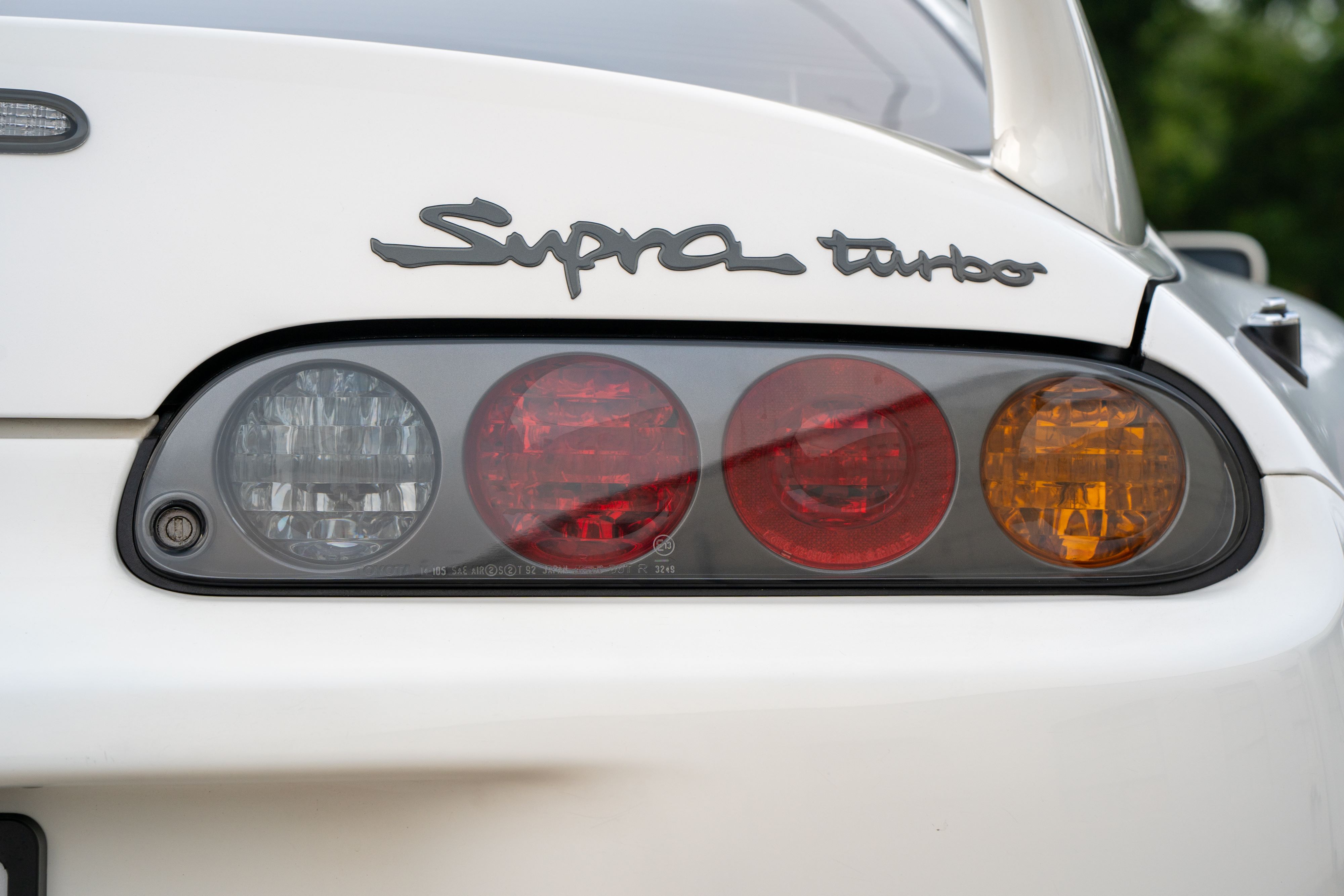 White 1994 Toyota Supra in downtown Austin, TX.