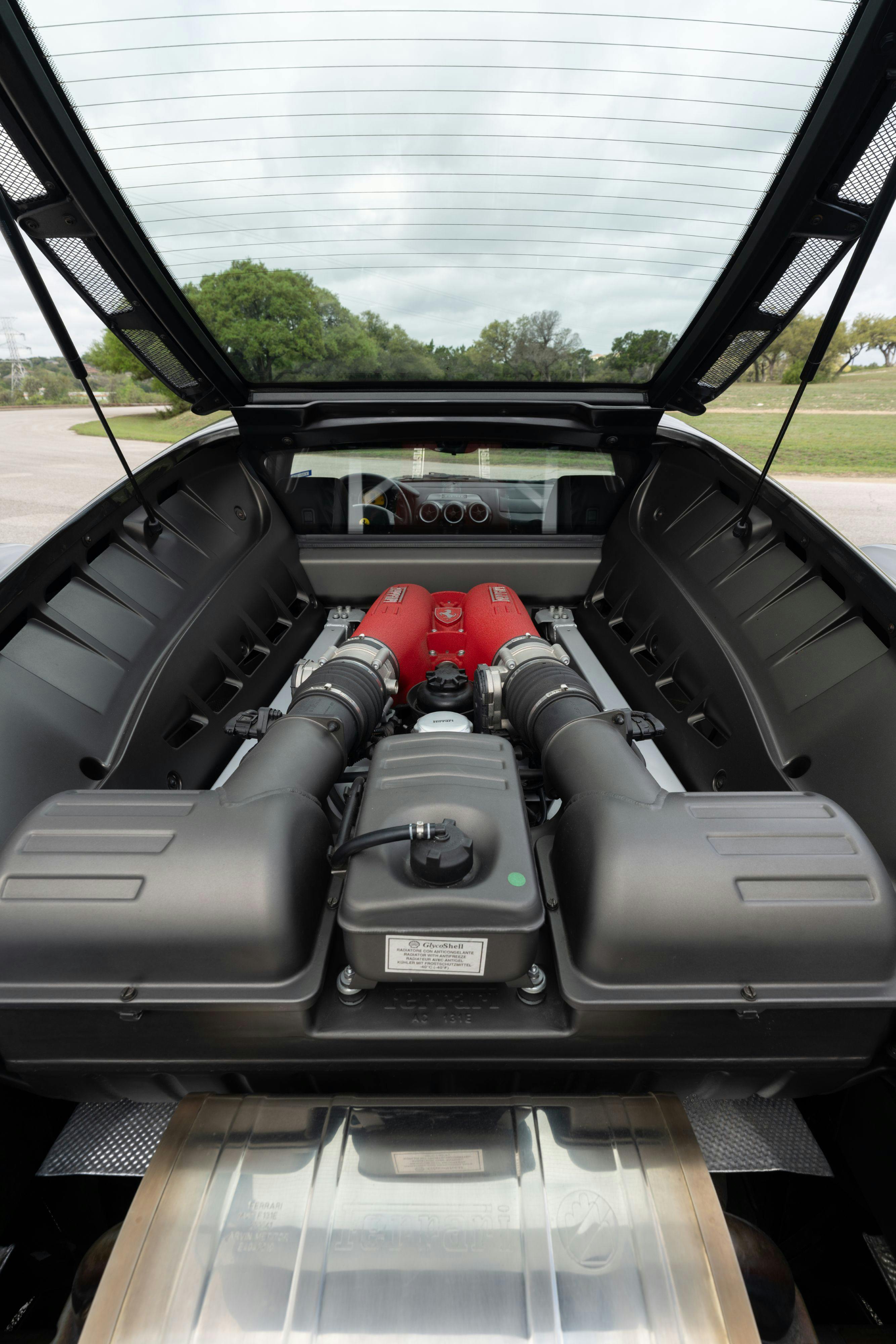 2008 Ferrari F430 engine bay in Grigio Silverstone on Black in Lakeway, TX.