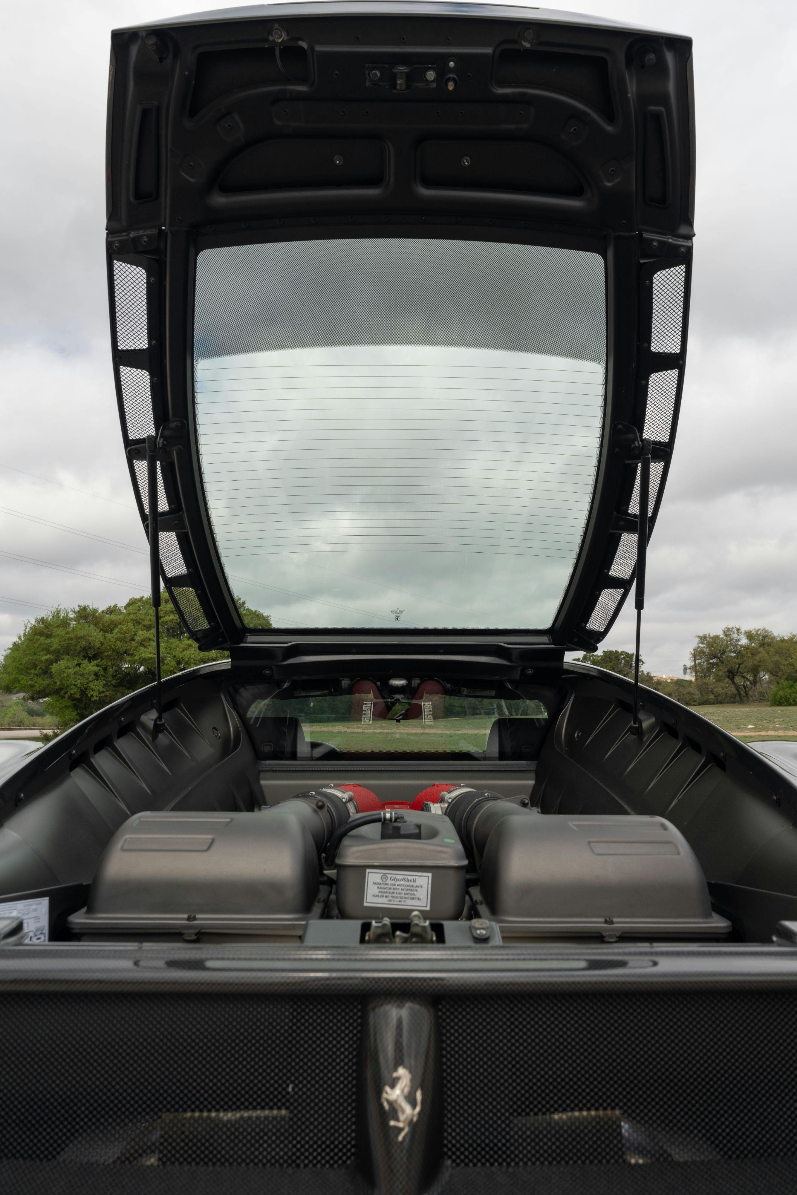 2008 Ferrari F430 engine bay in Grigio Silverstone on Black in Lakeway, TX.