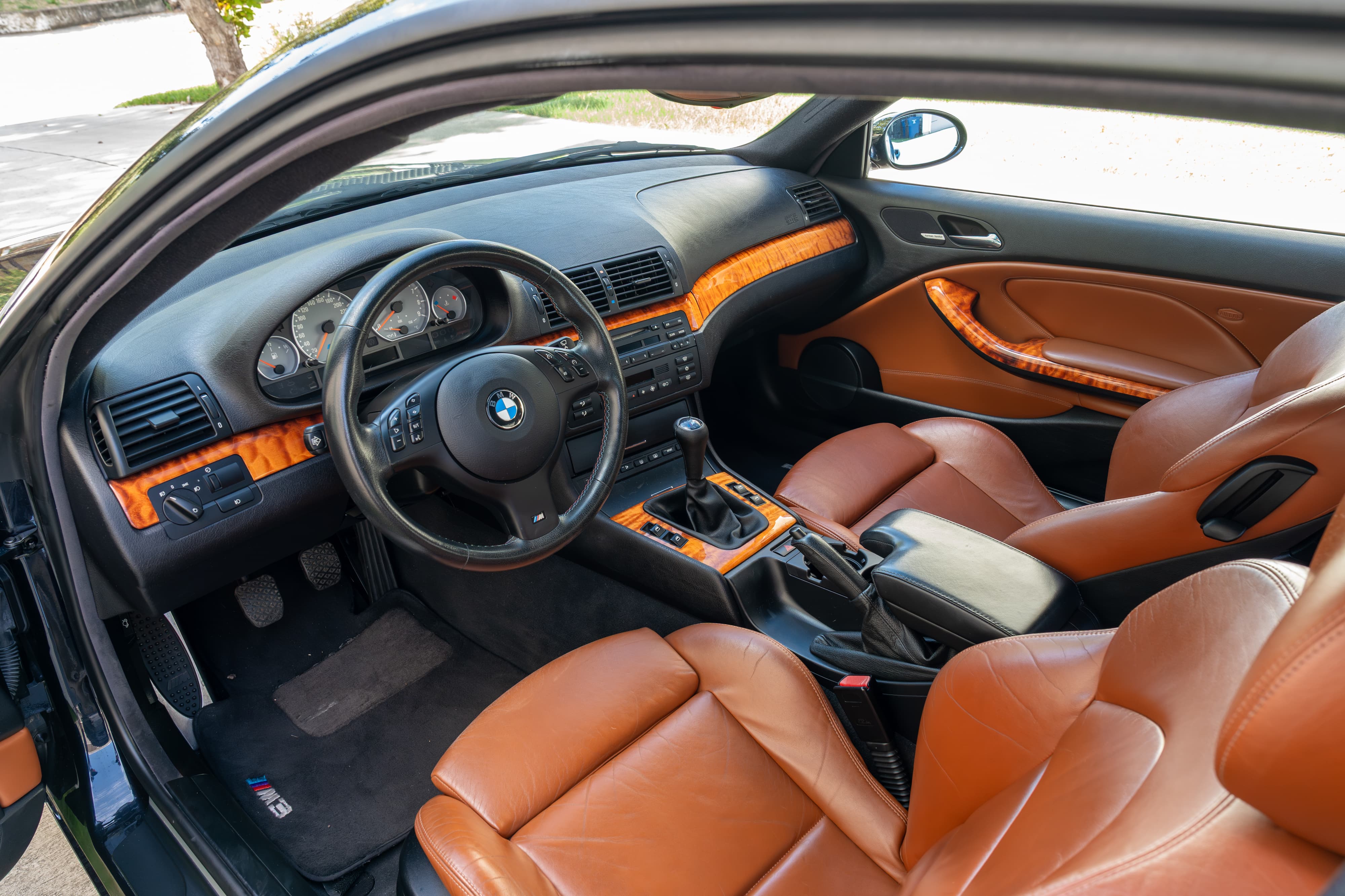 Interior of an Individual Carbon Black 2002 BMW M3 6-Speed in San Antonio, TX.