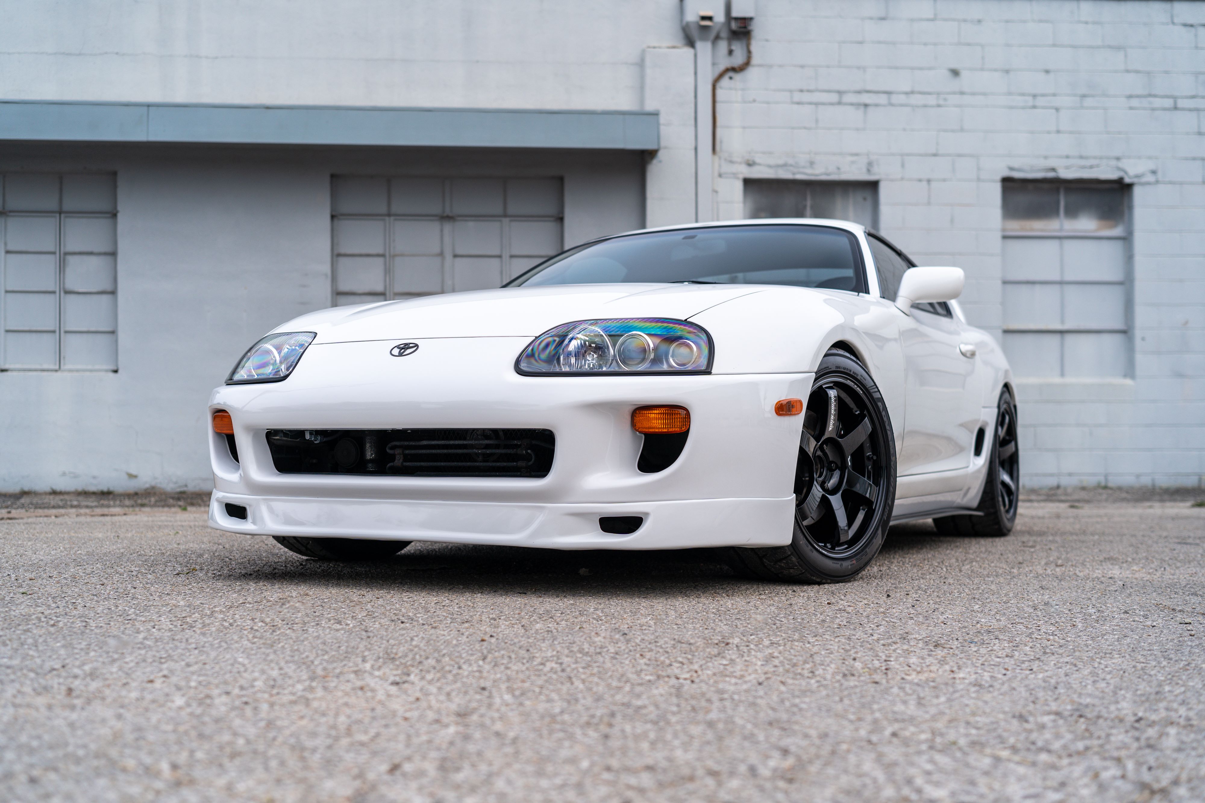 White 1994 Toyota Supra in downtown Austin, TX.