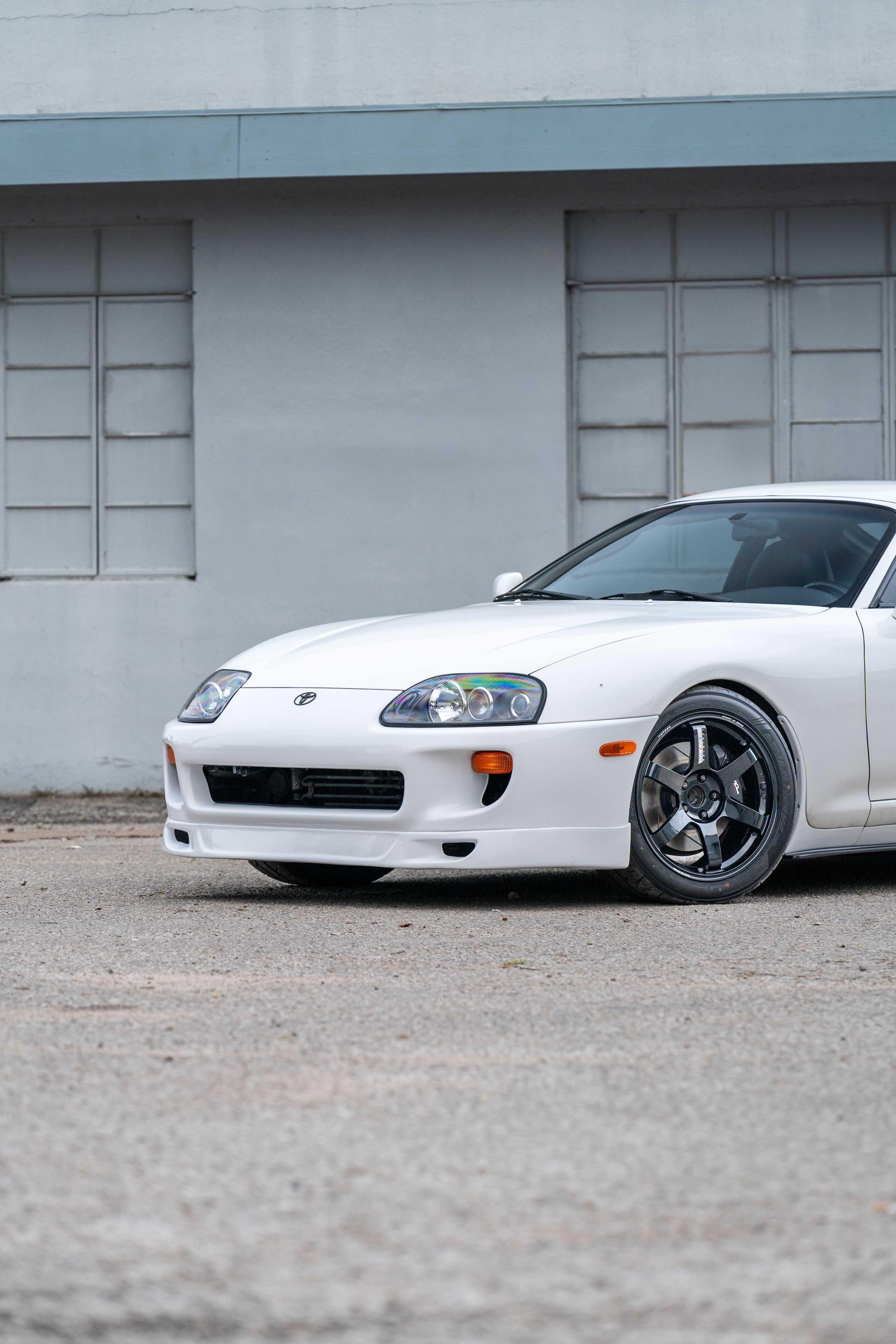 White 1994 Toyota Supra in downtown Austin, TX.