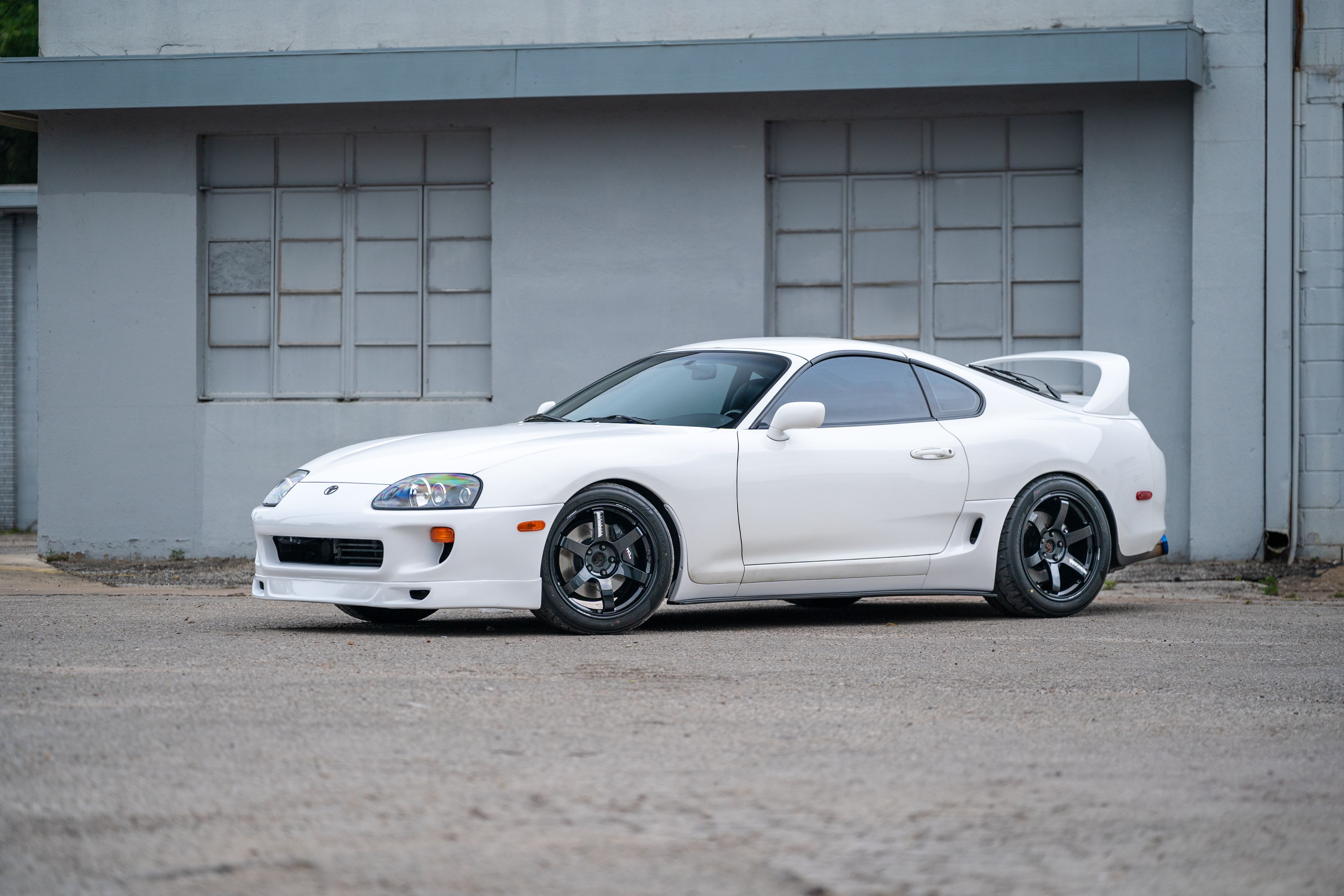 White 1994 Toyota Supra in downtown Austin, TX.