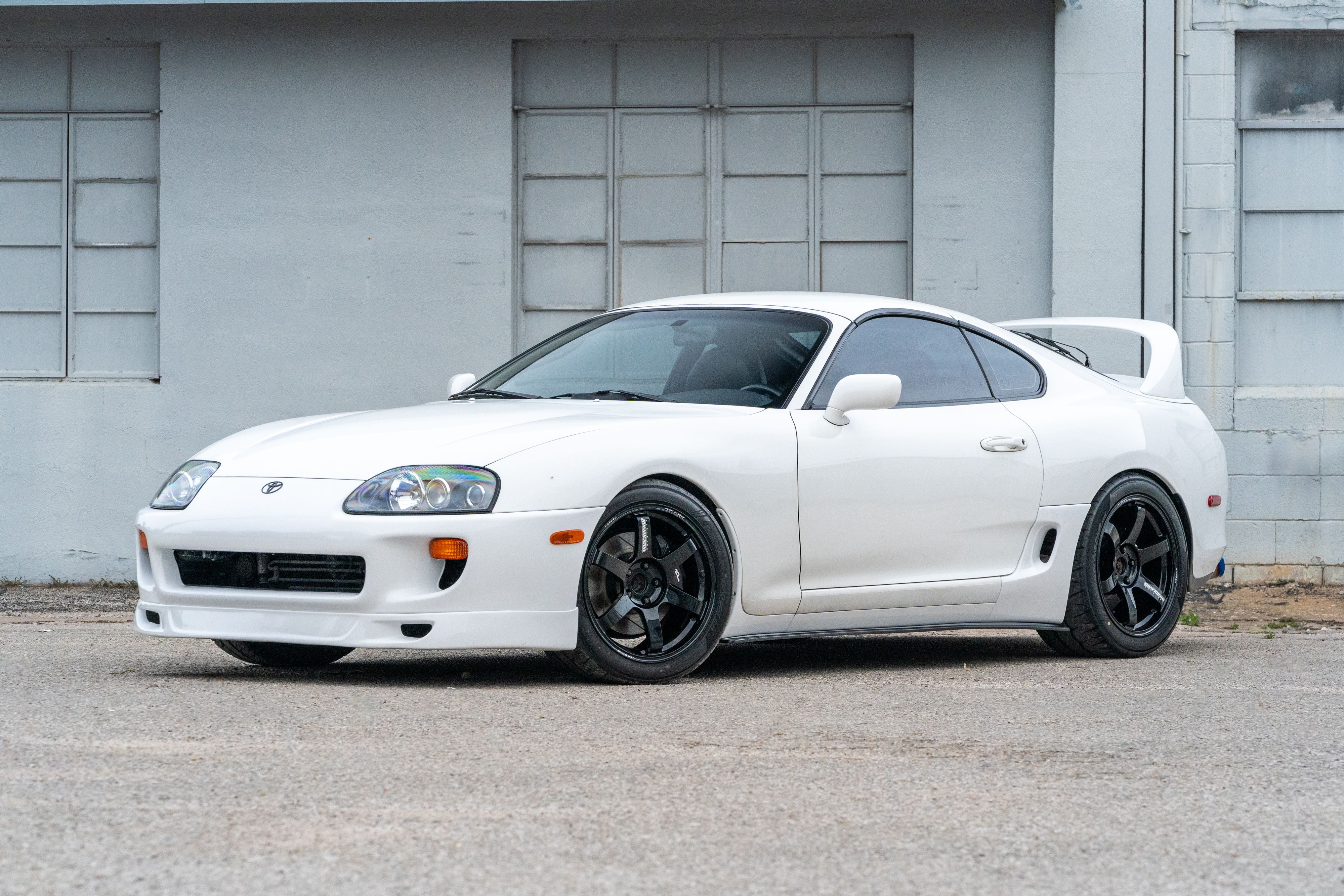 White 1994 Toyota Supra in downtown Austin, TX.