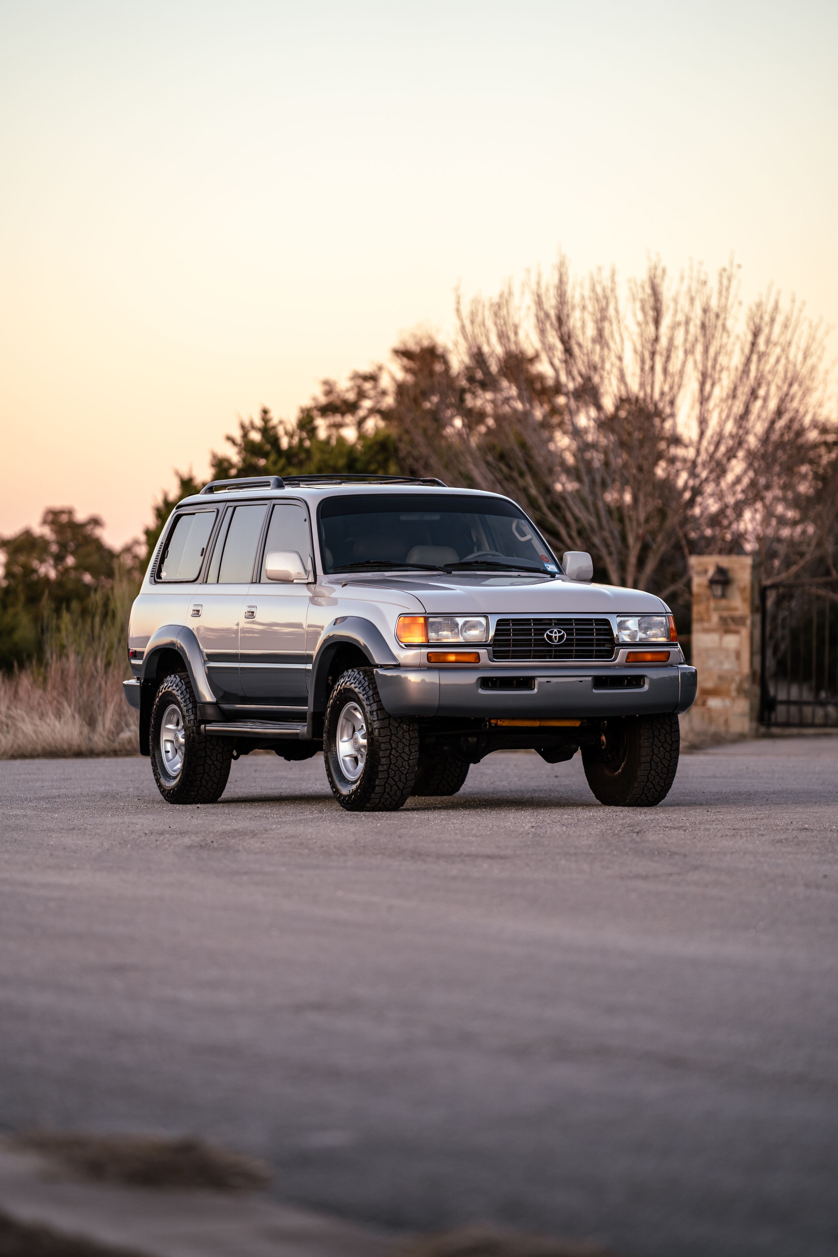 1997 Toyota Land Cruiser FJZ80 in Desert Dune Metallic with Moonglow Pearl cladding.