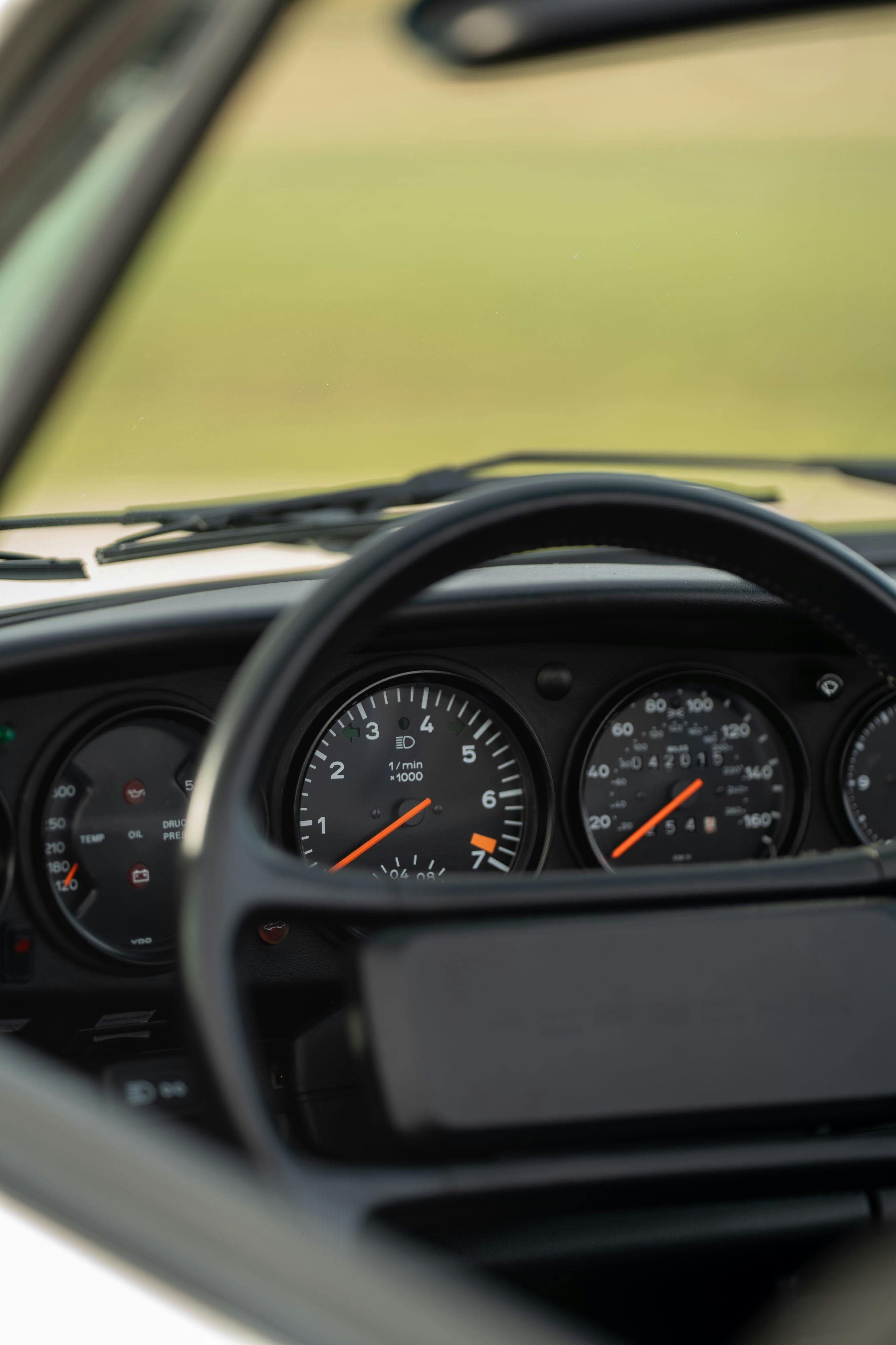 1986 Porsche 930 Turbo interior in White on Black with the factory slatenose M505 option.