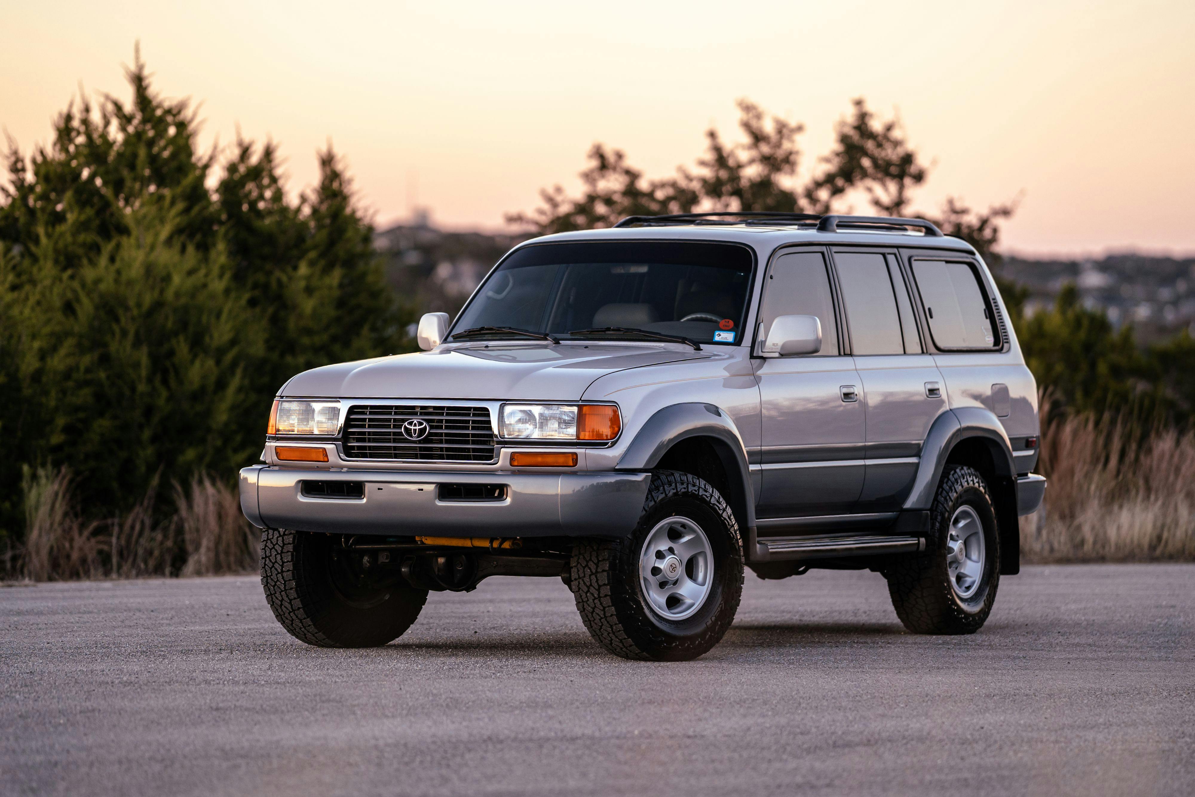1997 Toyota Land Cruiser FJZ80 in Desert Dune Metallic with Moonglow Pearl cladding.
