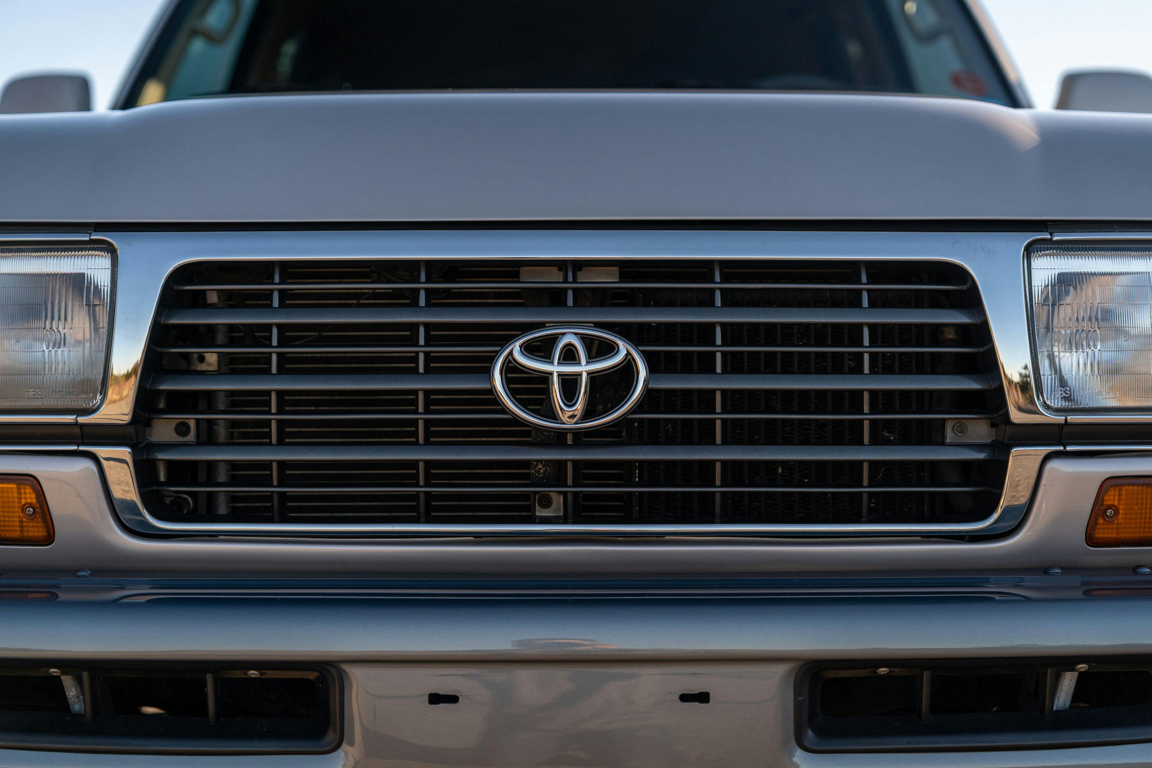 1997 Toyota Land Cruiser FJZ80 in Desert Dune Metallic with Moonglow Pearl cladding.
