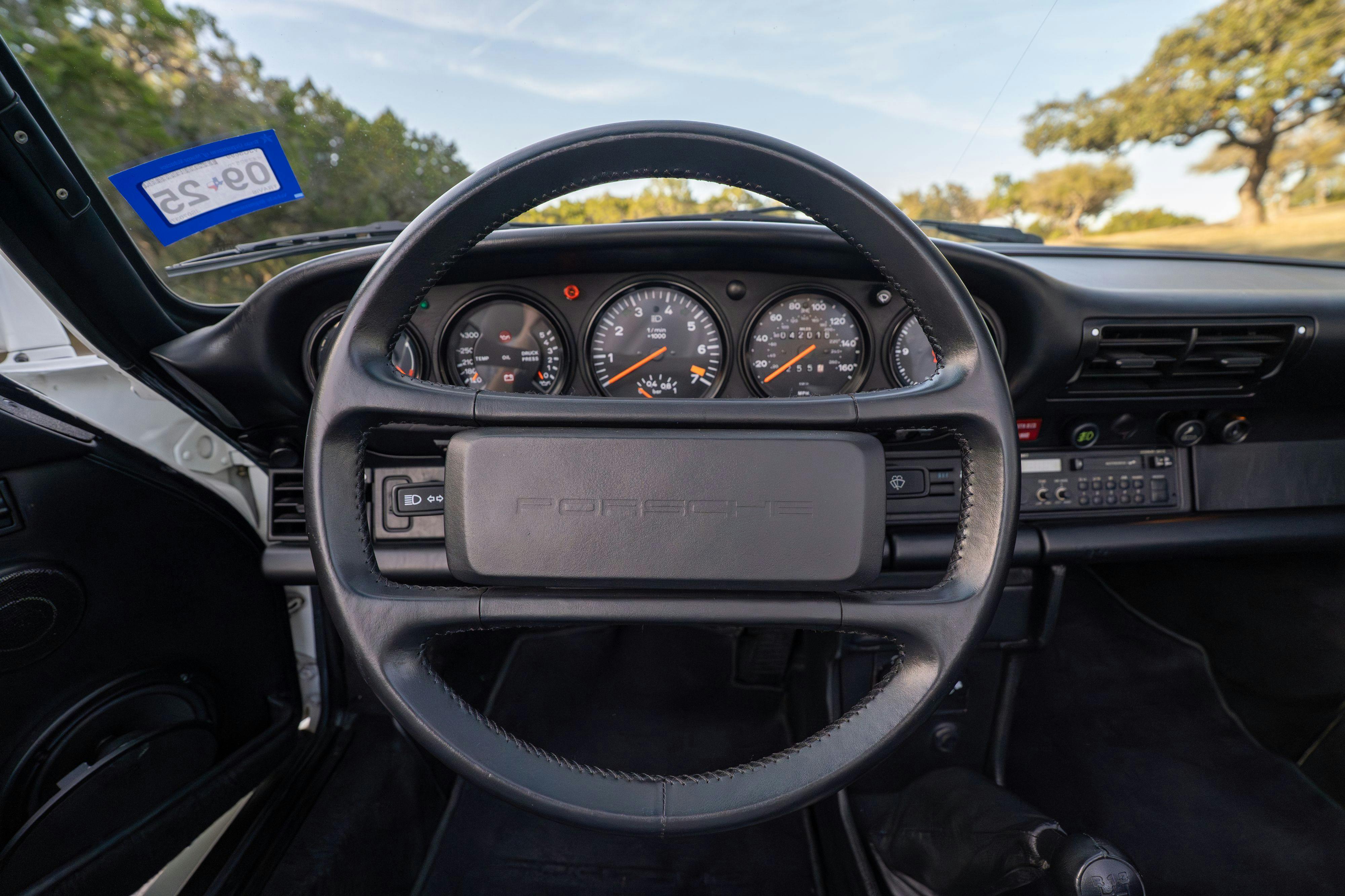1986 Porsche 930 Turbo interior in White on Black with the factory slatenose M505 option.