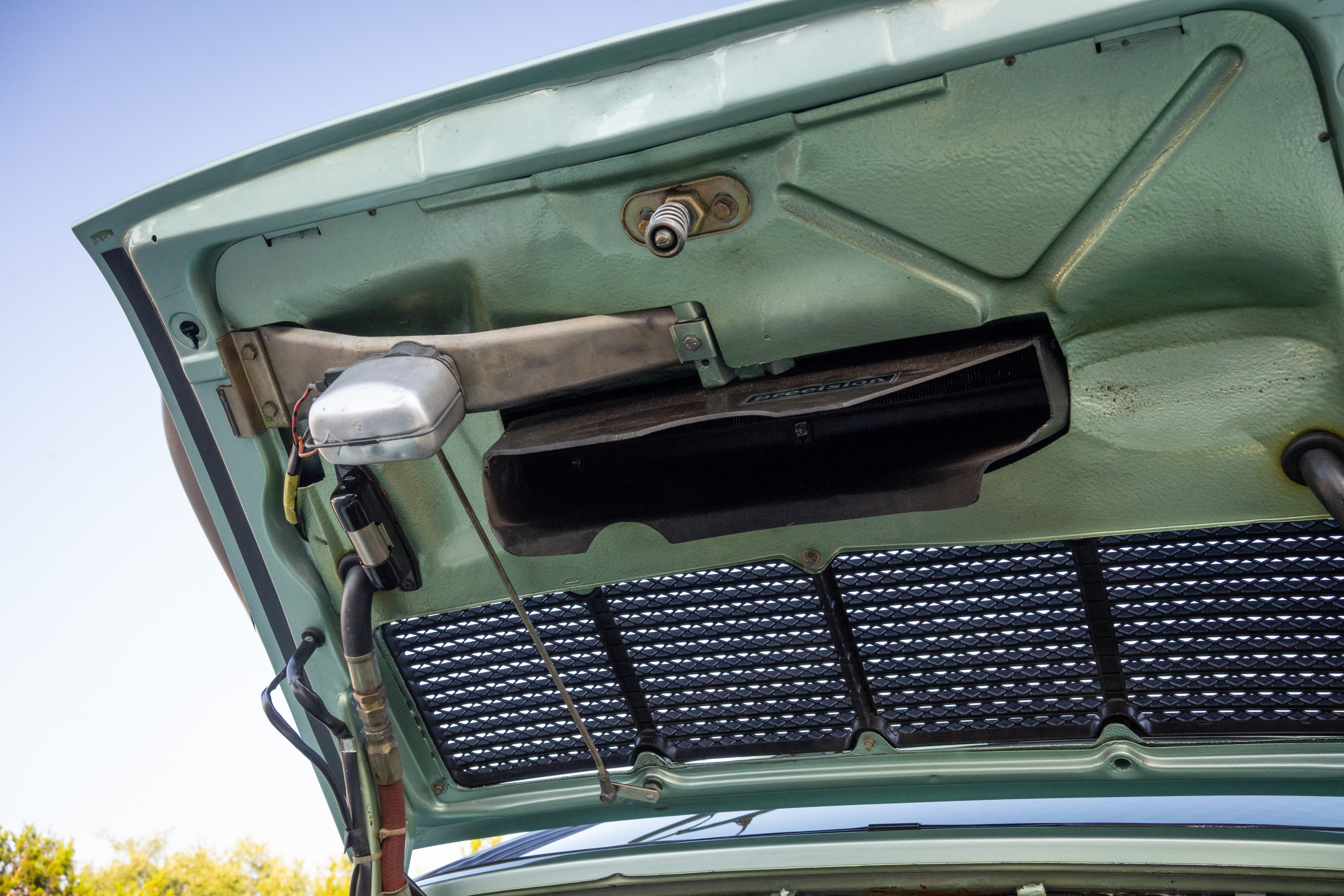 Underside of the trunk lid on a Ice Metallic Green 930 Turbo.