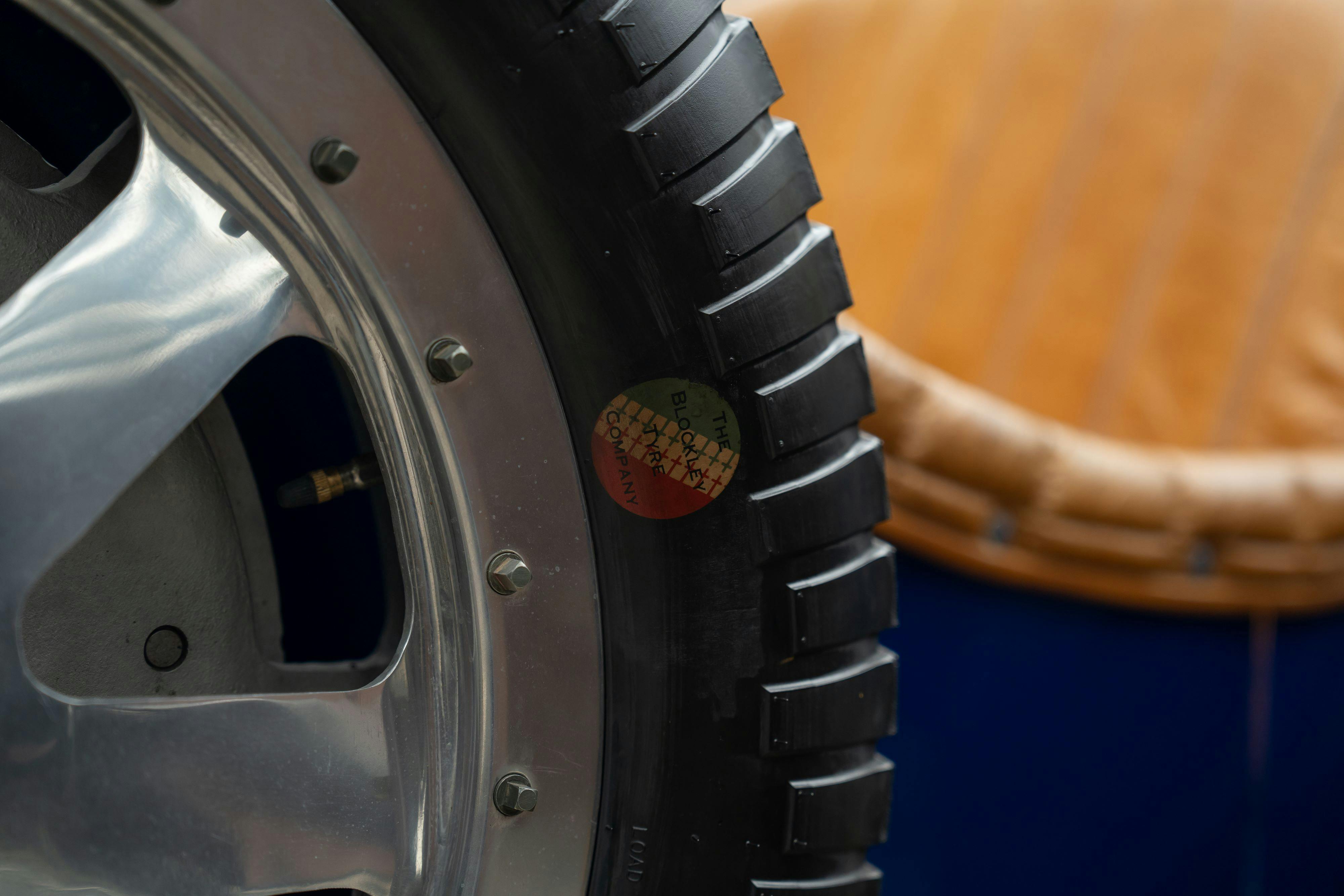 Spare tire on a Pur Sang Bugatti Type 35 in Blue over Brown shot in Austin, TX.