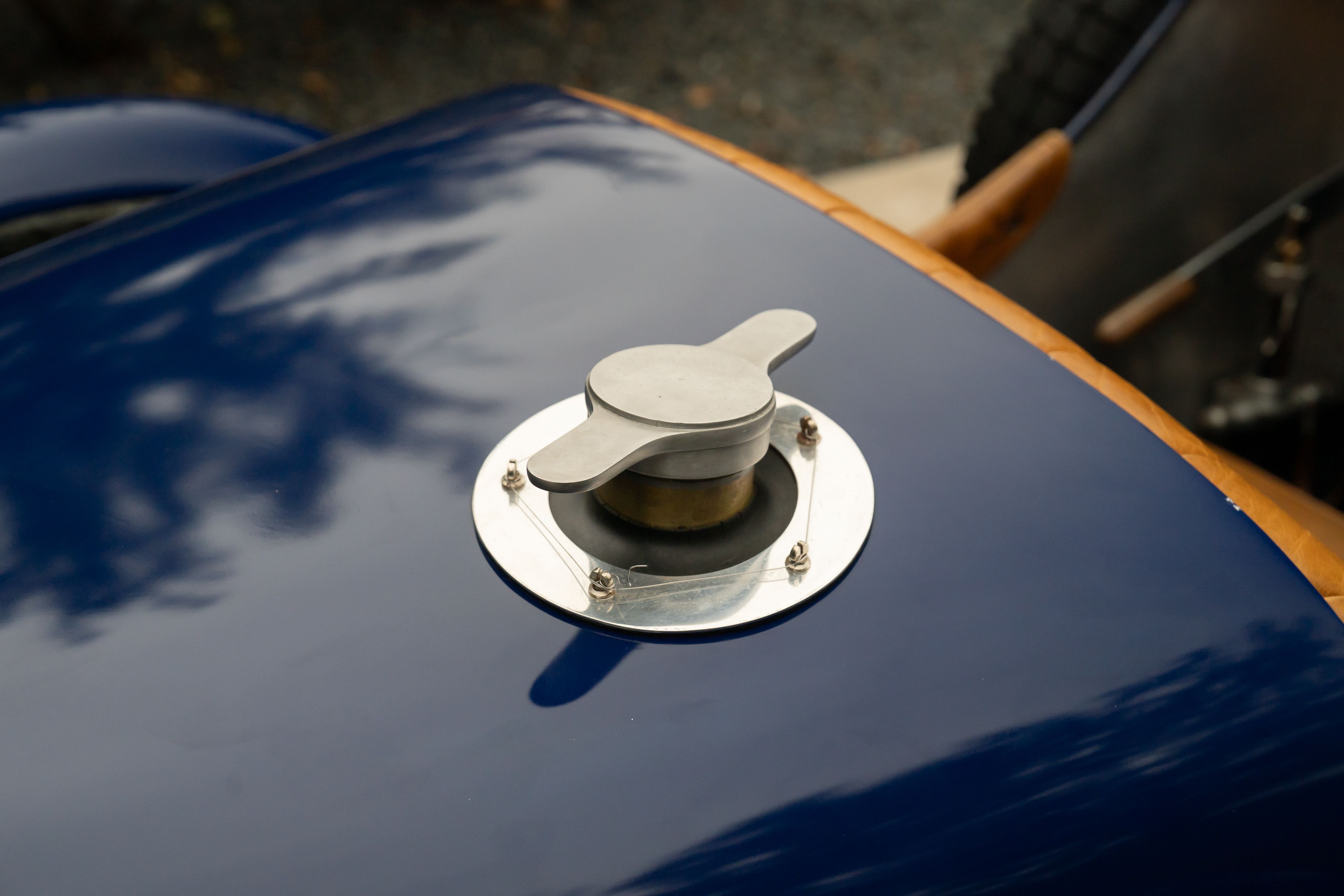 Fuel cap on a Pur Sang Bugatti Type 35 in Blue over Brown shot in Austin, TX.