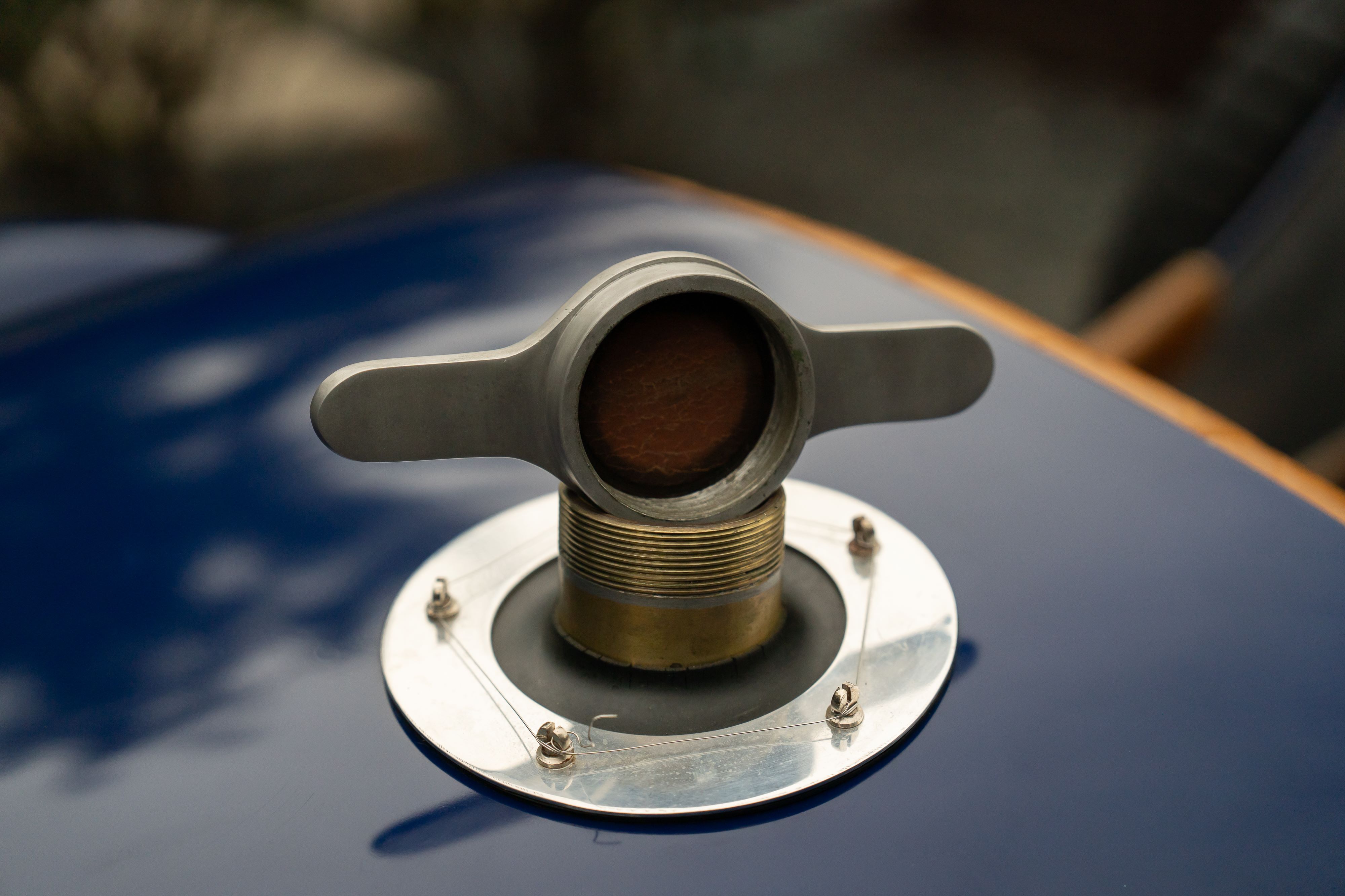 Fuel cap on a Pur Sang Bugatti Type 35 in Blue over Brown shot in Austin, TX.