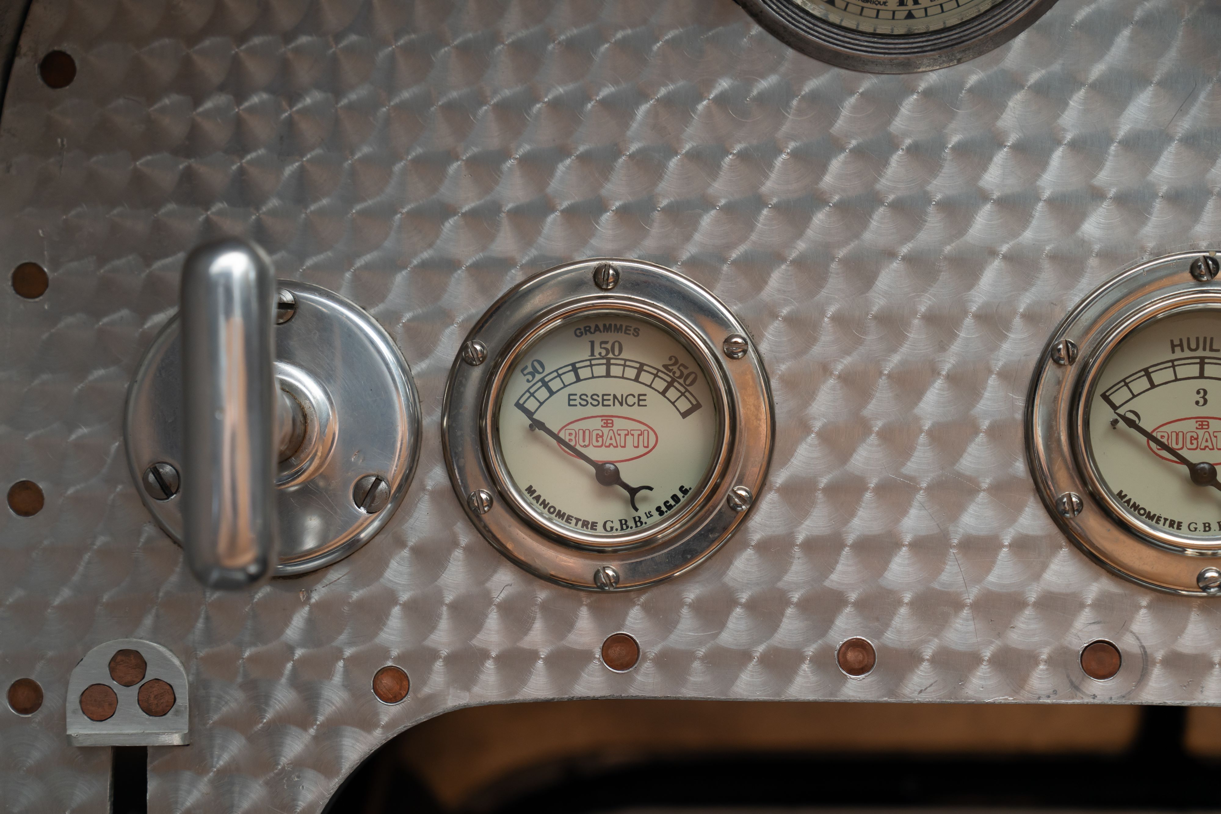 Gauges on a Pur Sang Bugatti Type 35 in Blue over Brown shot in Austin, TX.