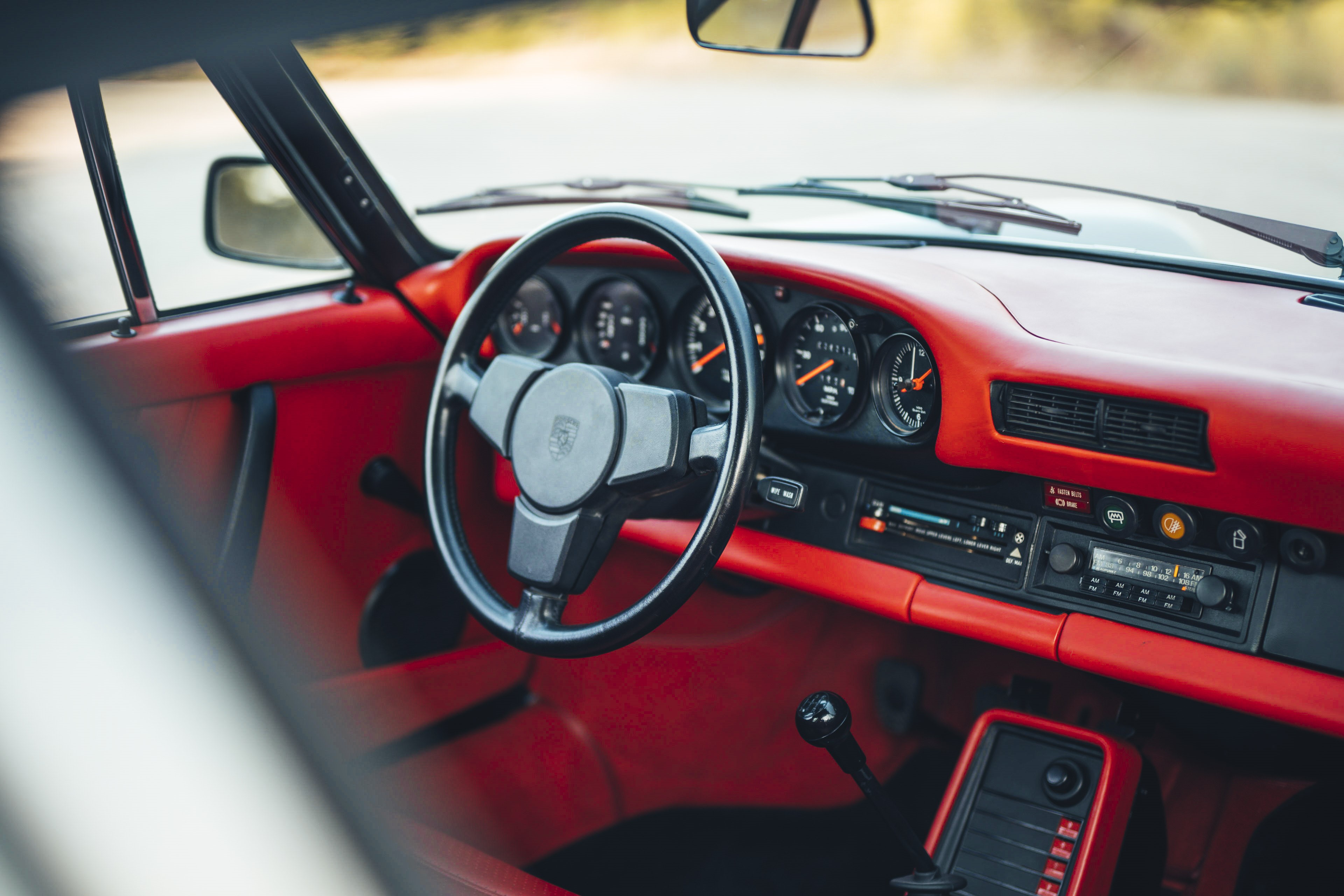 Light red interior on a 1977 Porsche 911S.