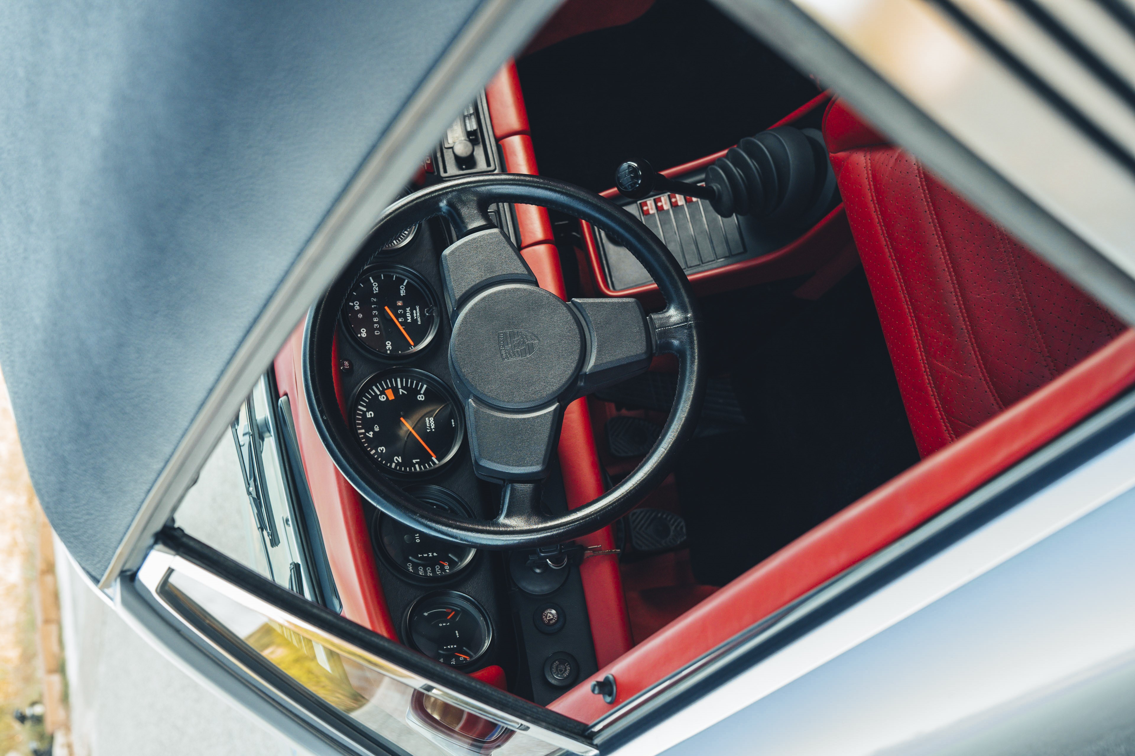 Light red interior on a 1977 Porsche 911S.